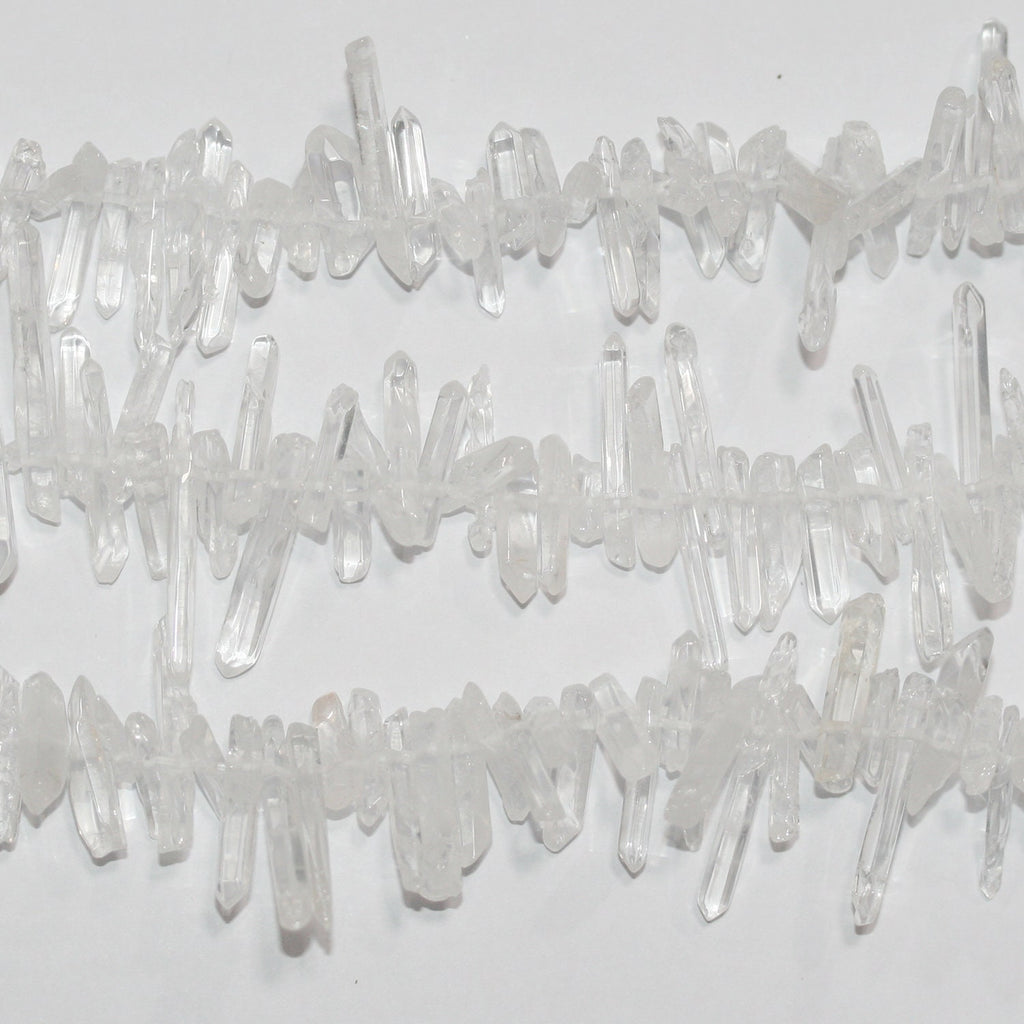 Perlas de cristal de roca de cuarzo sin pulir de 16", 25-18 x 5 mm, aprox., hilo de 40 cm.