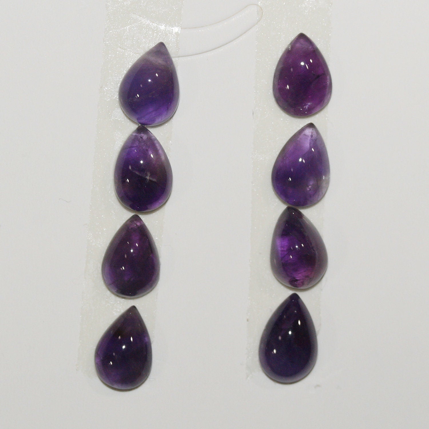 Lote de 8 cabujones de amatista lisos de 10 x 7 mm. (8 piezas).