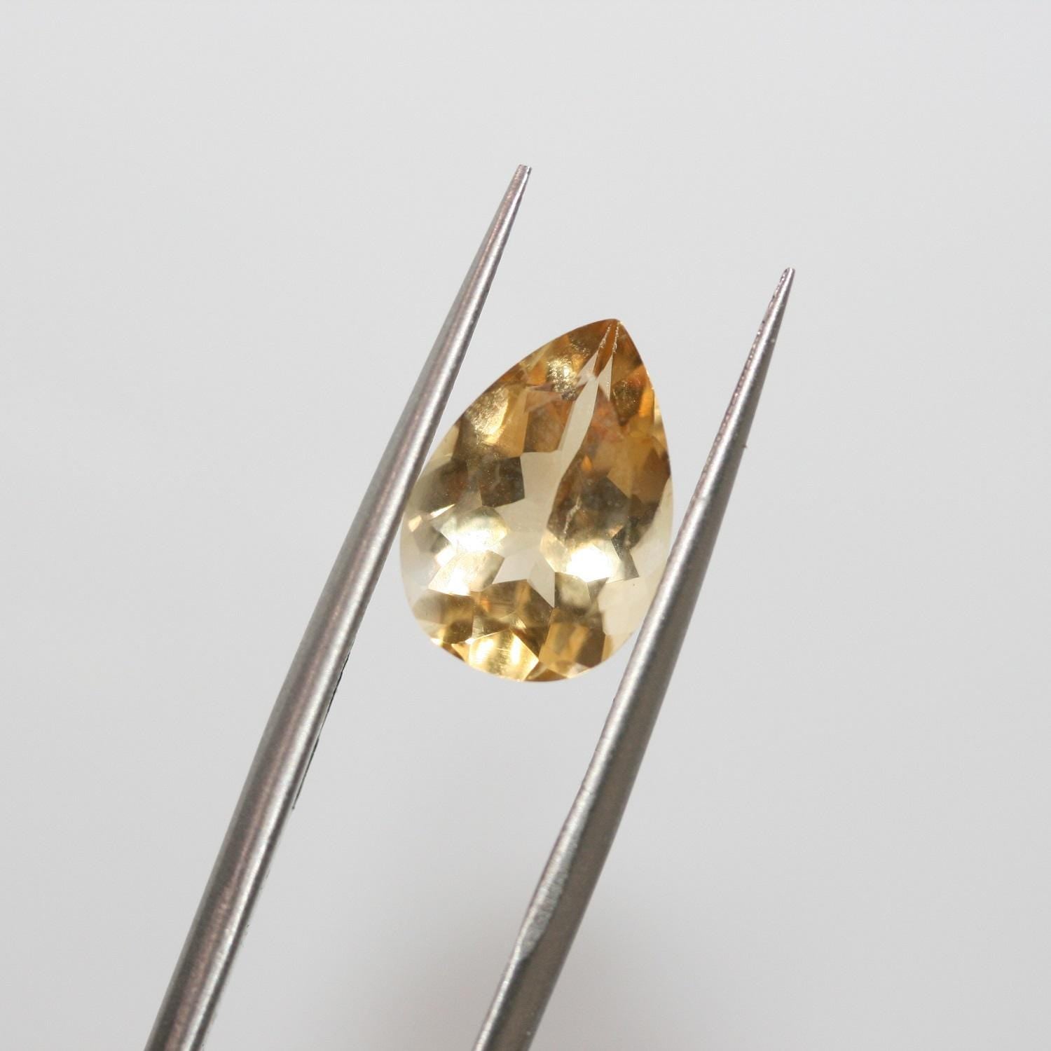 Lote de 2 piezas de citrino facetado gota 13x9 mm. (2 piezas).