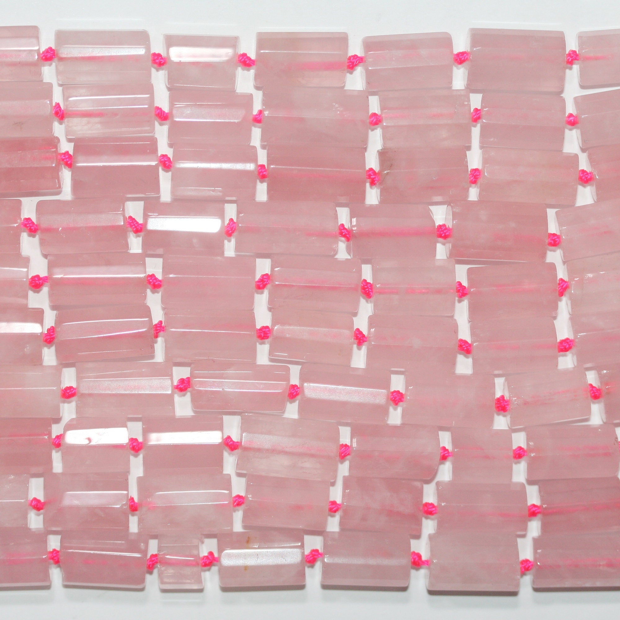 Cuentas tubulares facetadas de cuarzo rosa de 16" (15 x 9 mm). Longitud aproximada: 41 cm.