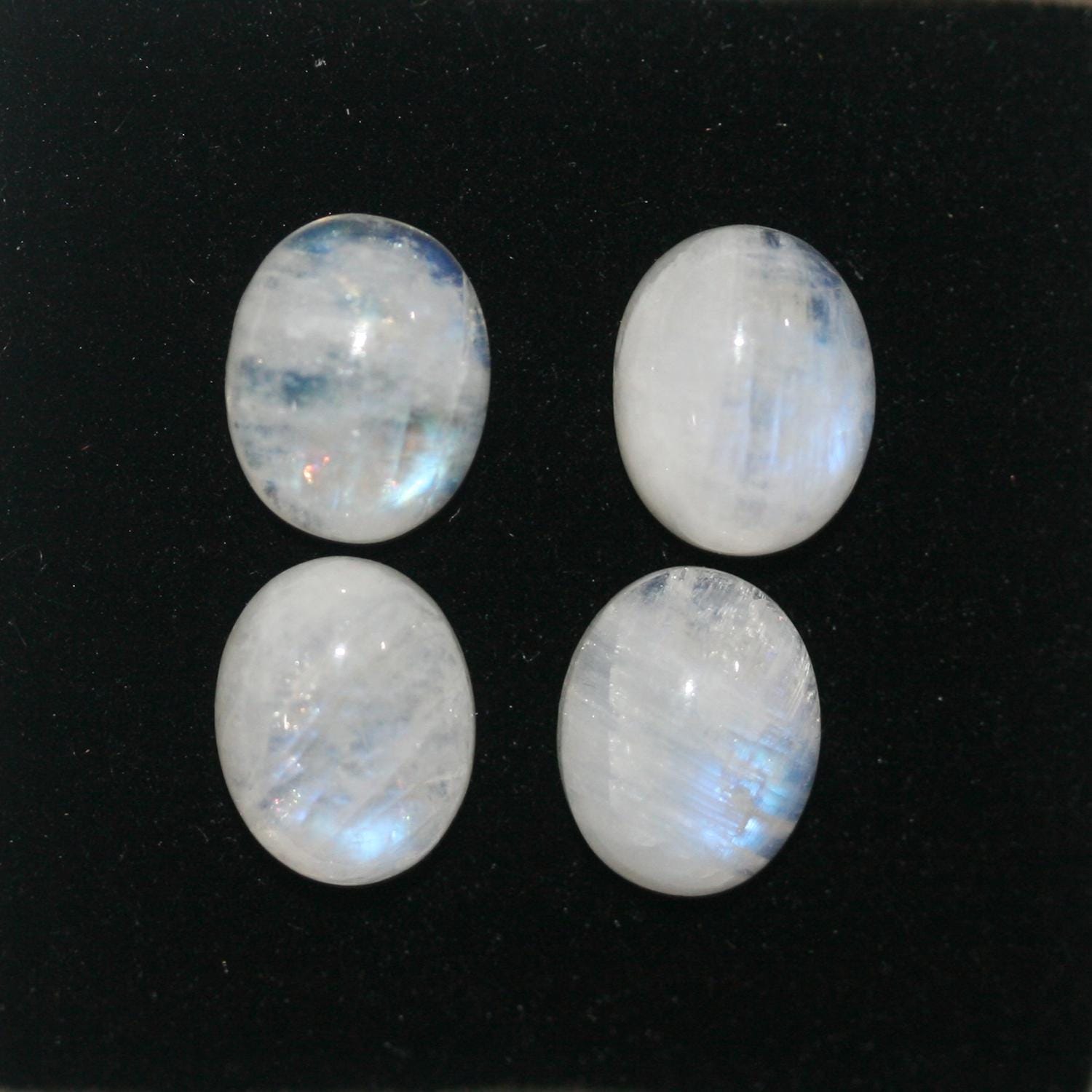 4 cabochons ovales lisses en pierre de lune 10x8mm.- (4 pièces)