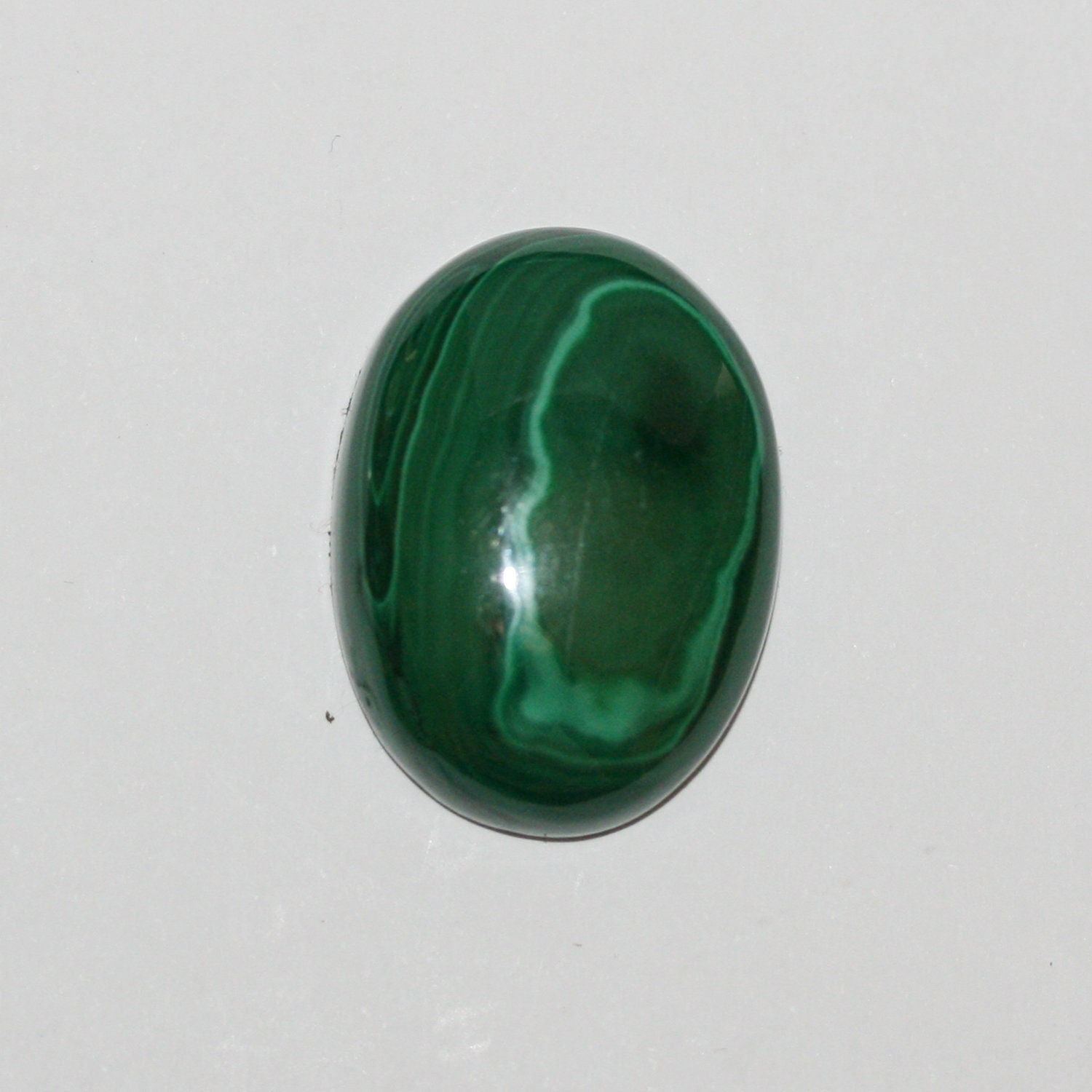 Malachite Oval Cabochon 28x20mm.(55.7ct)