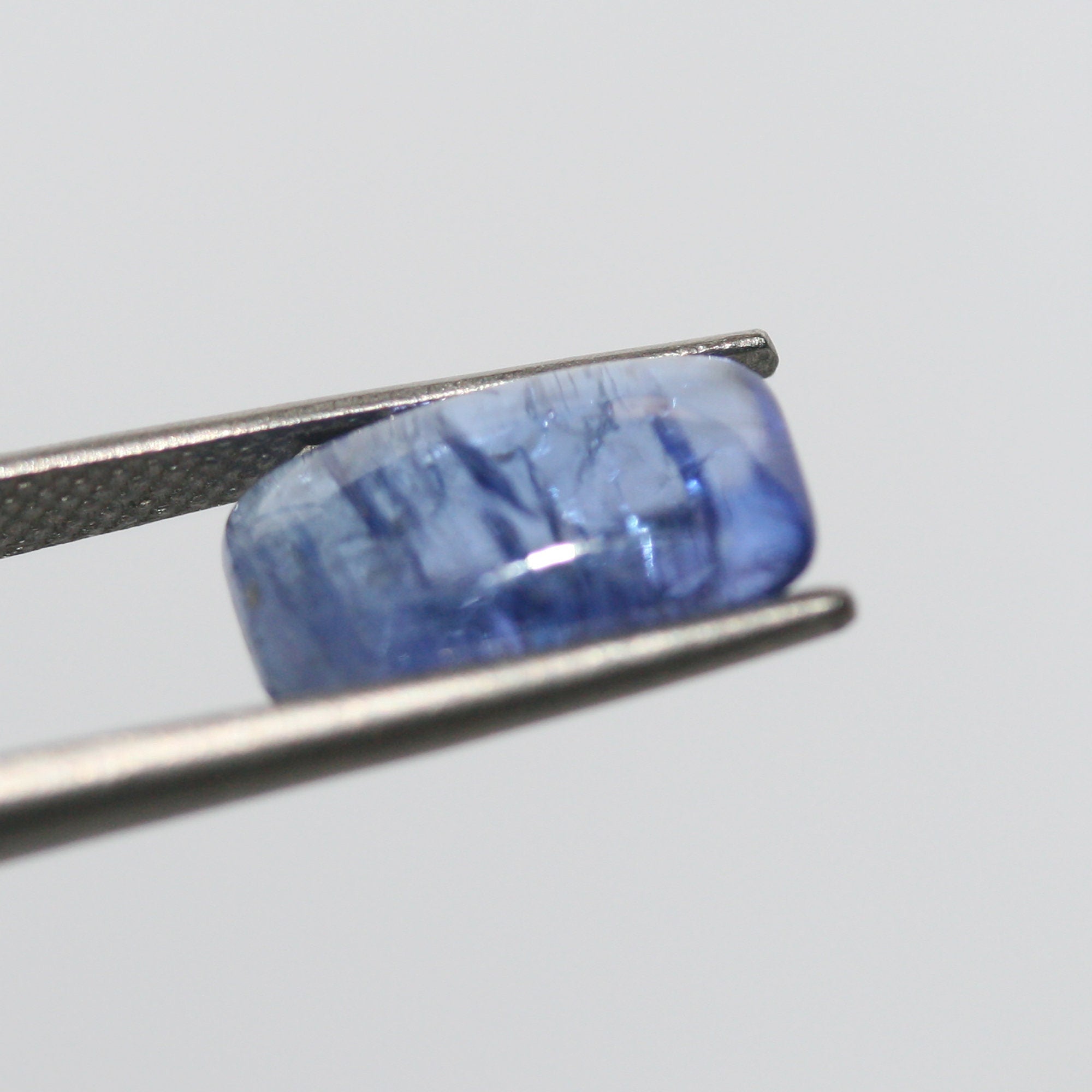 Tanzanite Rectangular Cabochon 12.7x7.3mm.-(4.3ct)