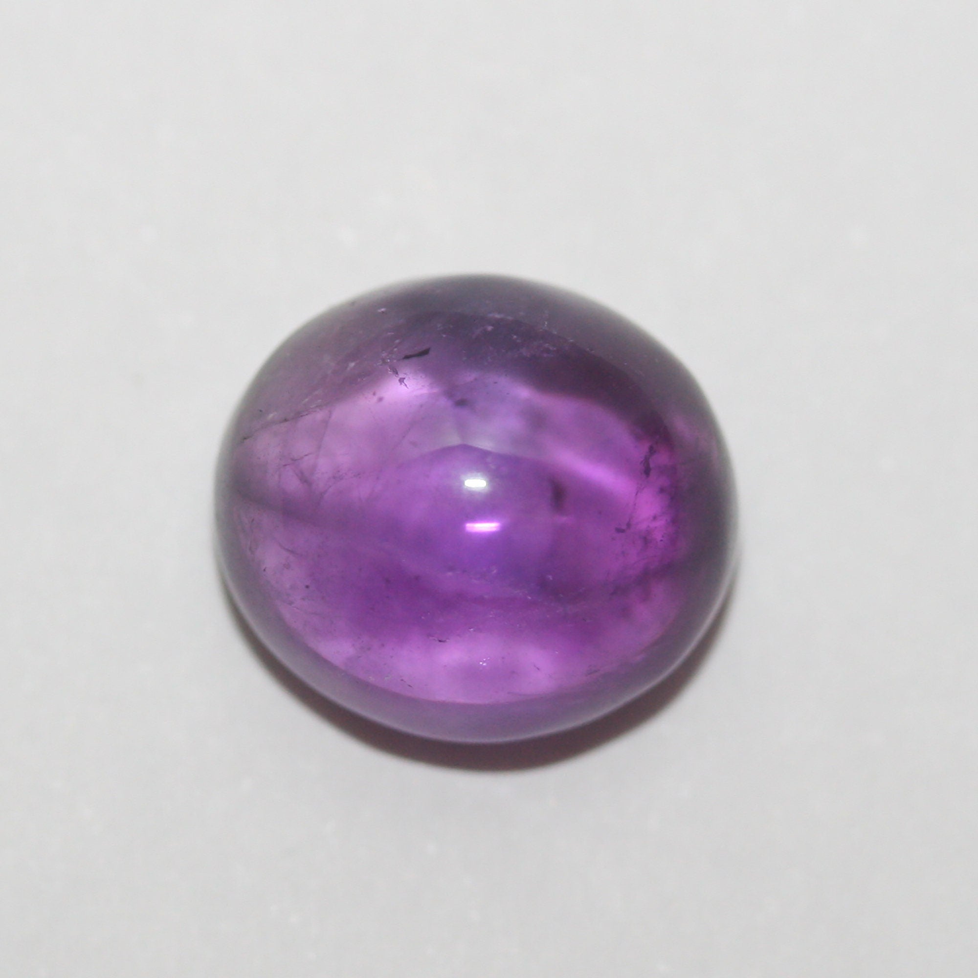 African Amethyst Oval Cabochon 13x11.5mm.-(8.8ct).
