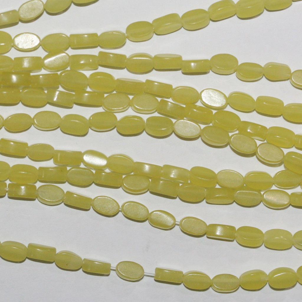 Cuentas ovaladas lisas de serpentina de 16" de St., 6 x 4 mm. Tira de 40 cm.