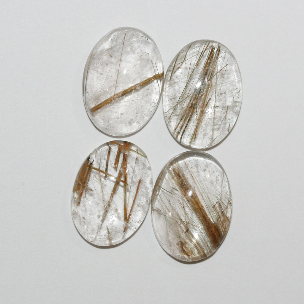 Lote de 4 cabujones ovalados de cuarzo rutilado de 16 x 12 mm. (4 uds.)