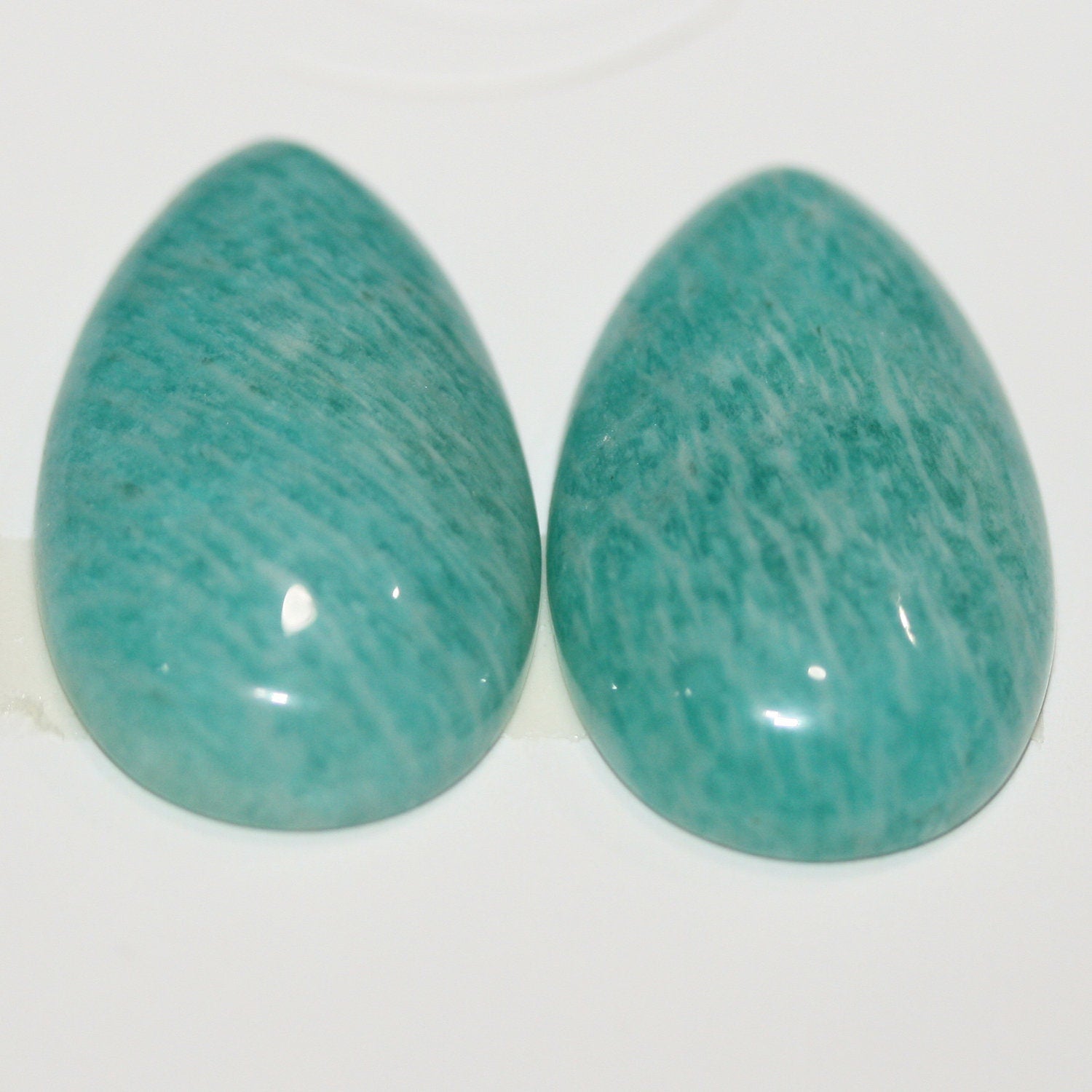 Lote de 2 cabujones de amazonita lisos de 30 x 18 mm. (2 uds.)