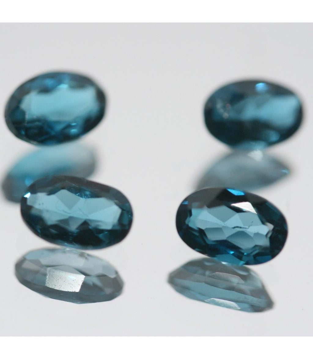 Lote de 4 piezas de topacio azul de Londres facetado ovalado de 6 x 4 mm (4 piezas)