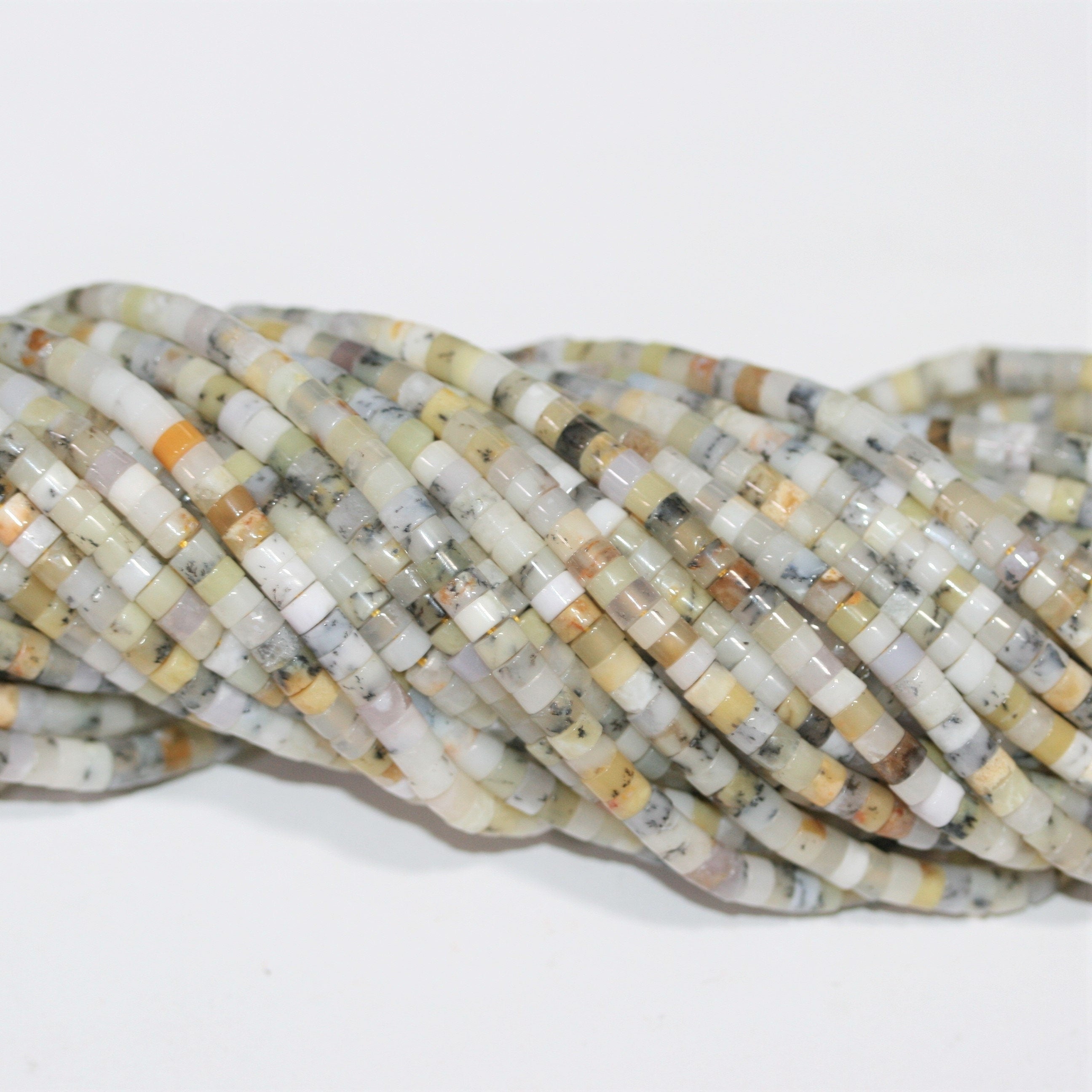 Perles disques lisses en opale colorée 15" 4x2mm.- Brin 39cm.