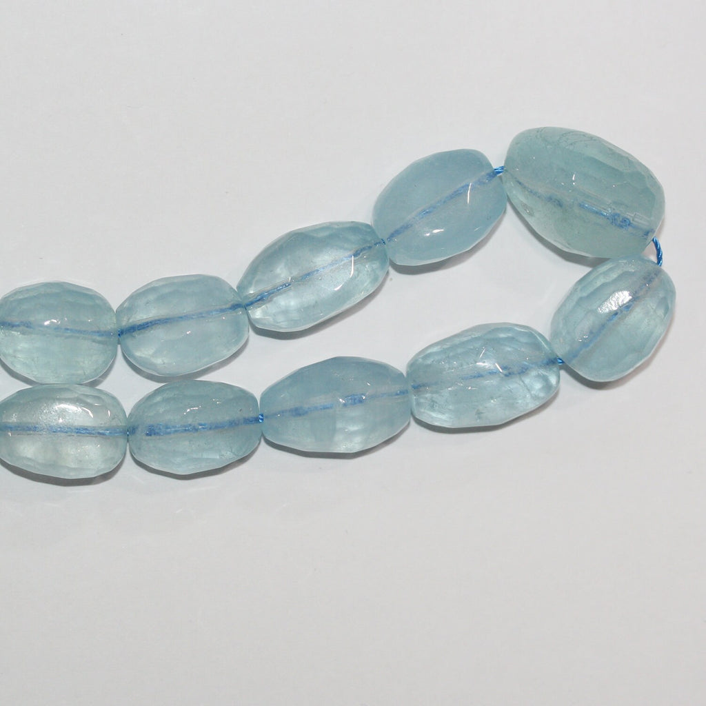Cuentas de aguamarina de 43 cm (17"), facetadas y graduadas, de barril, 10 x 7-19 x 13 mm (aprox. - Hilo de 44 cm)