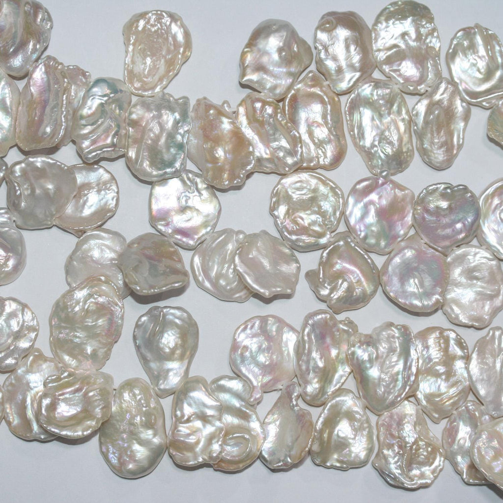 Perla Keshi de Agua Dulce de 16" (20 x 15 mm). Hilo aproximado de 40 cm. Precios al por mayor.