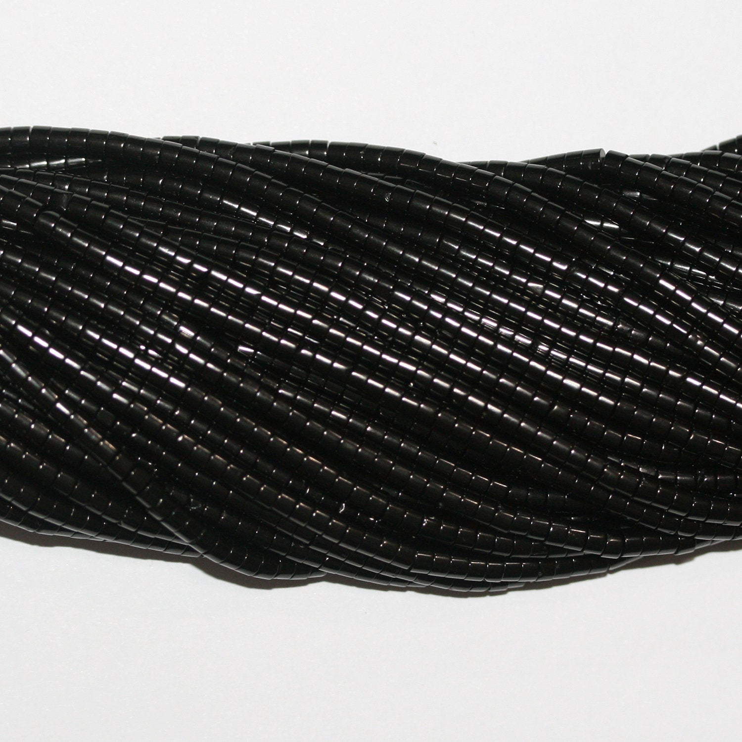 Perles disques lisses St Jet 15" 3x2mm.-Bracelet 39cm.