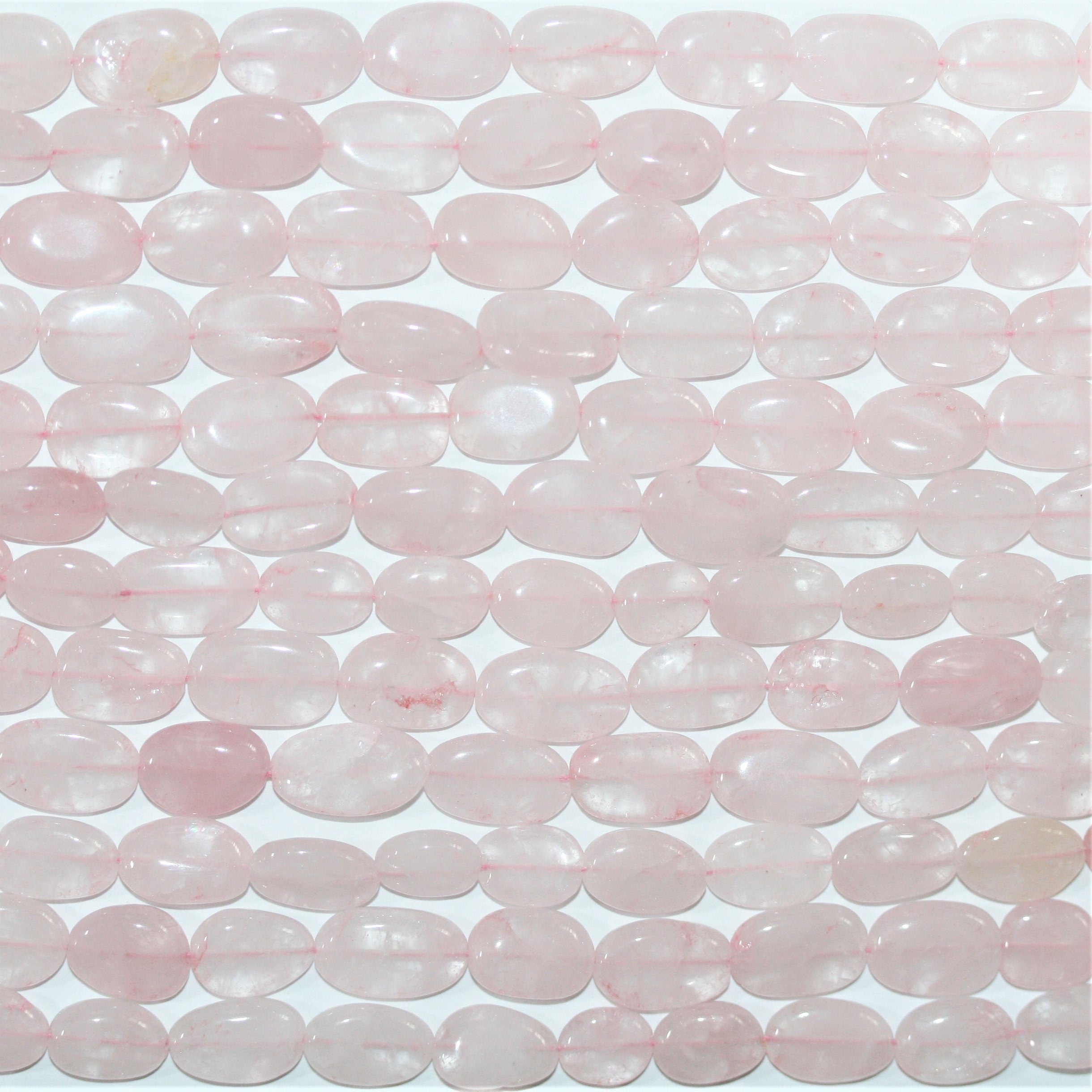 13" St Rose Quartz Smooth Oval Beads 14x9mm. Approx.- Strand 33cm.