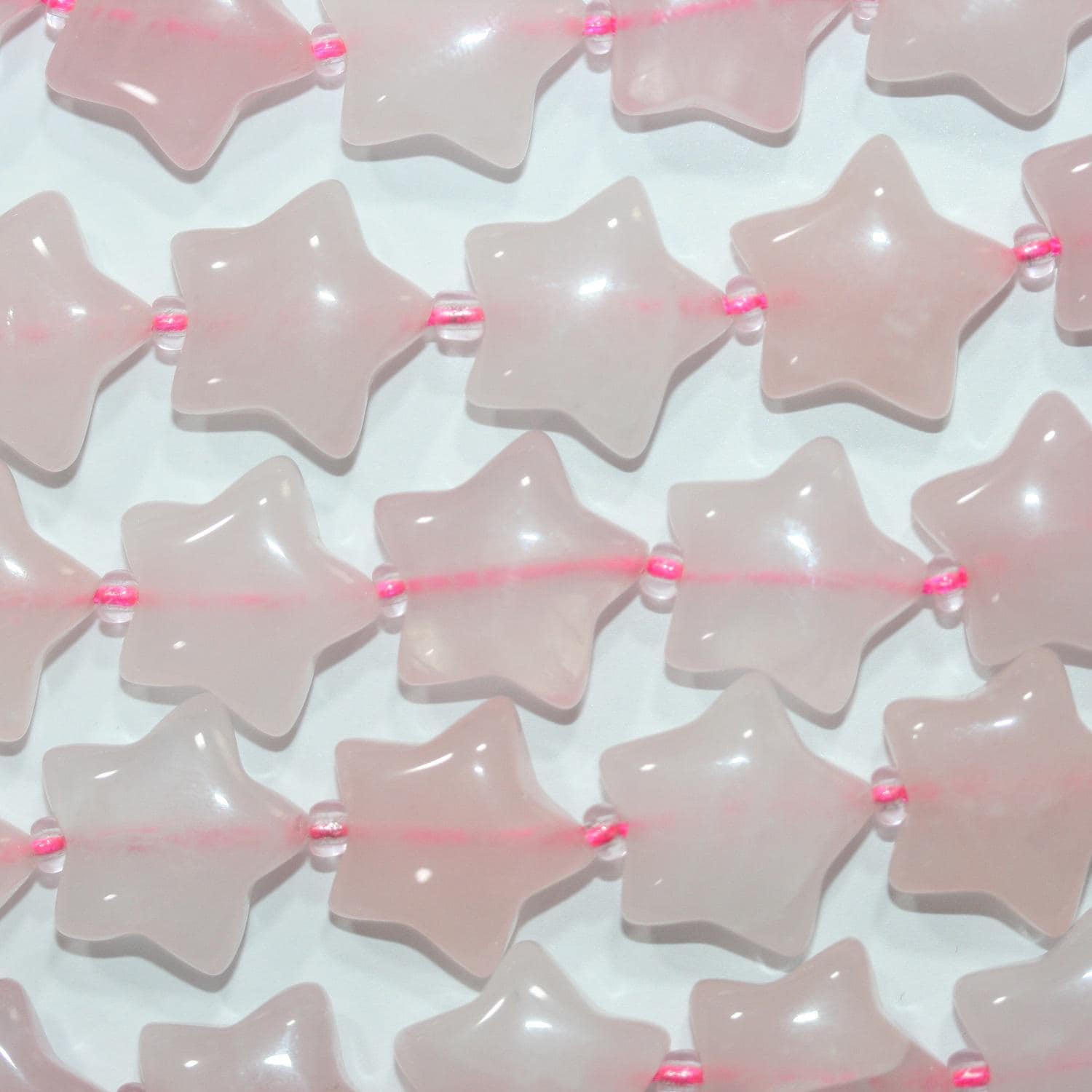 Perles en quartz rose lisse en forme d'étoile de 15 pouces (15-16 mm). - Fil de 39 cm.