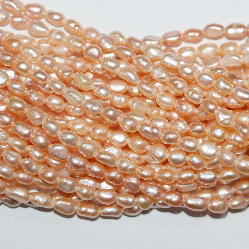 13" St FreshWater Salmon Oval Pearl 4-4.5mm.-Strand 35cm. -Natural Pearls wholesale Prices