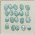 Lote de 20 cabujones ovalados de Larimar de 6 x 4 mm. (20 uds.).