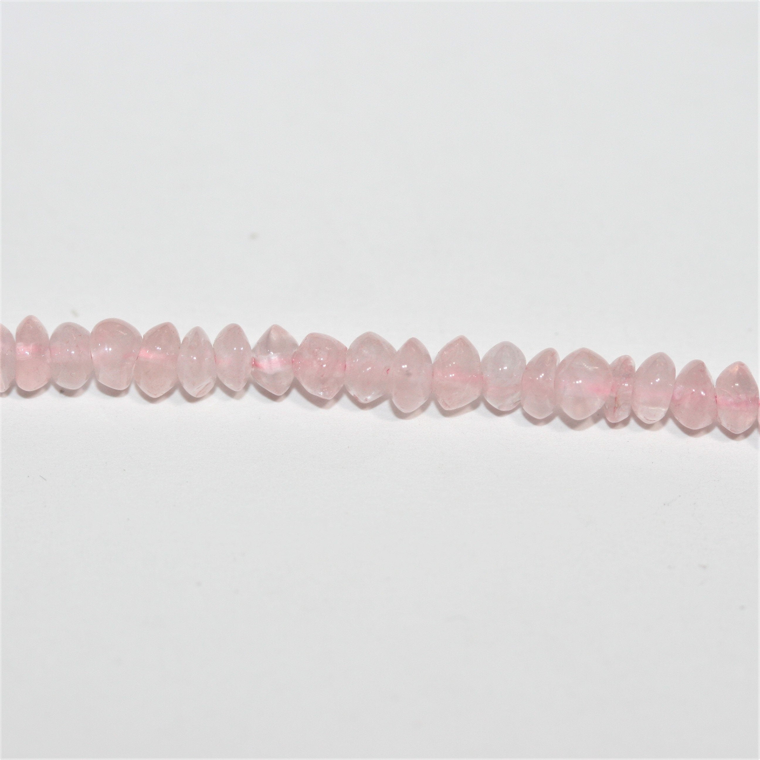 Perles rondelles lisses en quartz rose 4x2mm - Fil de 36cm.