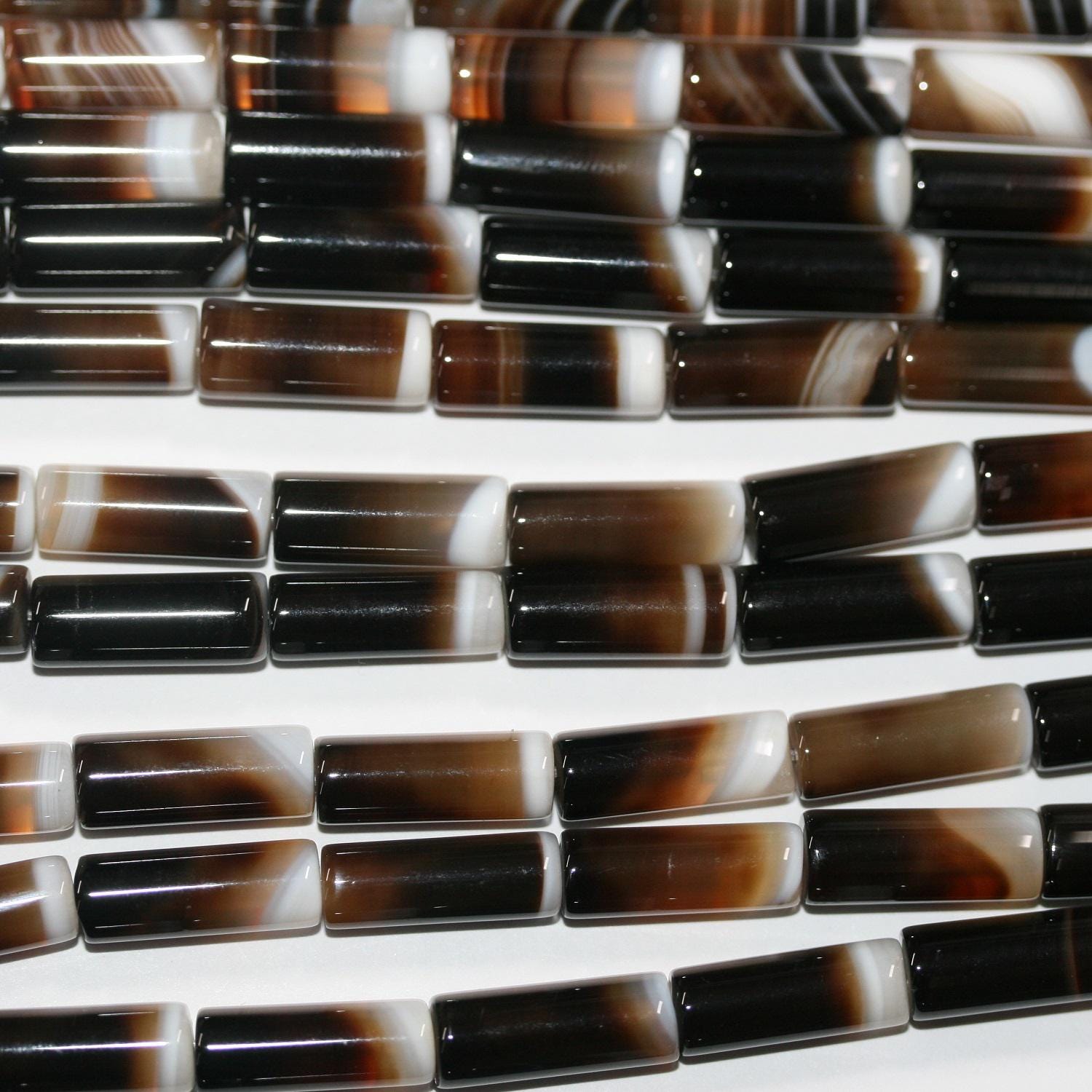 Cuentas tubulares lisas de ágata sardónice marrón de 40 cm, 26 x 14 mm aprox. - Hilo de 40 cm - Artículo 14711