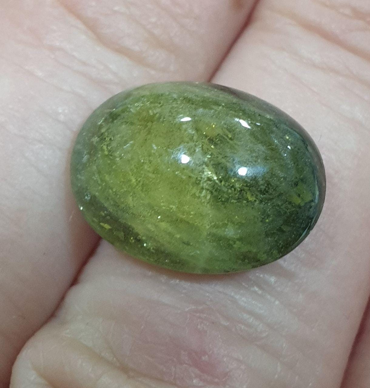 Natural Green  Sapphire Oval Cabochon. 15.8x12.2mm. (14ct.)