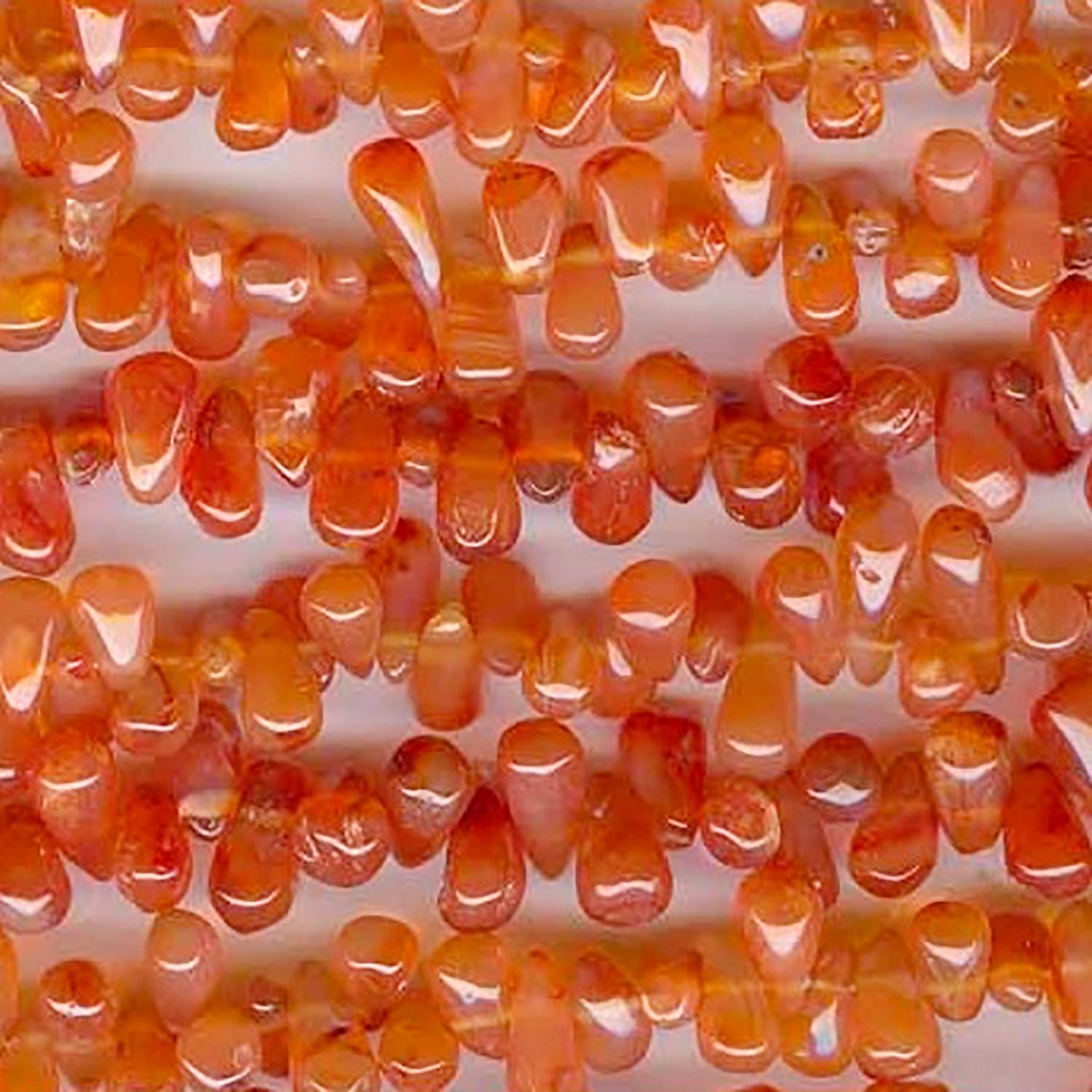 Perles en cornaline de 40 cm (16 pouces), 10 x 6 mm. Longueur approximative : 40 cm.