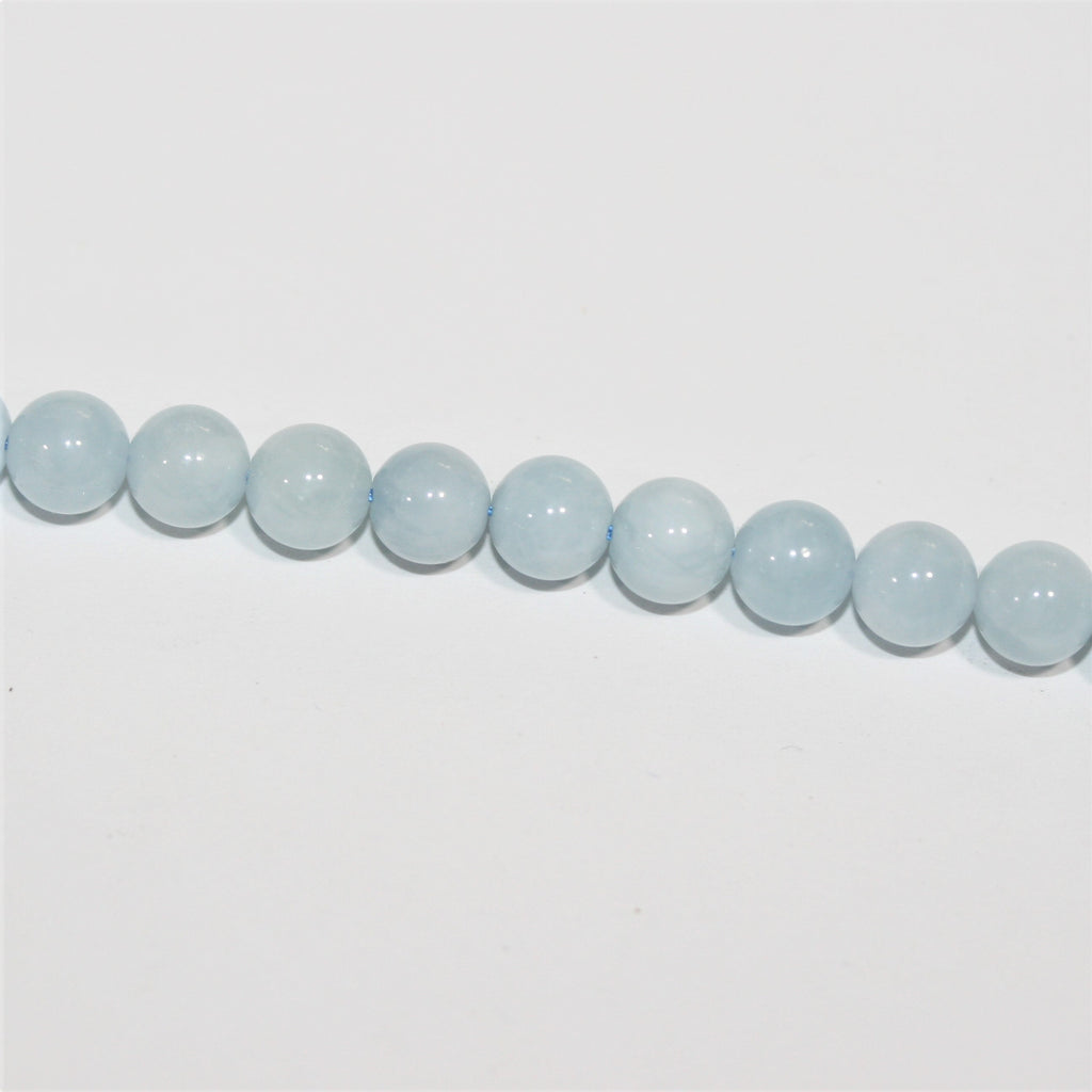 Cuentas redondas lisas de aguamarina 6- 6,5 mm.- Hilo 40cm.