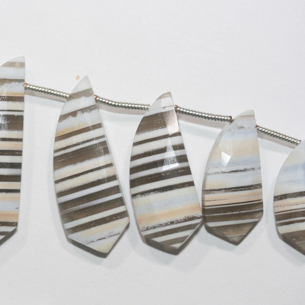 Cuentas de ópalo azul de 8" con facetas degradadas, 32 x 10 mm (aprox.) - 13,5 x 8 mm (tira de 20 cm). Artículo 14949