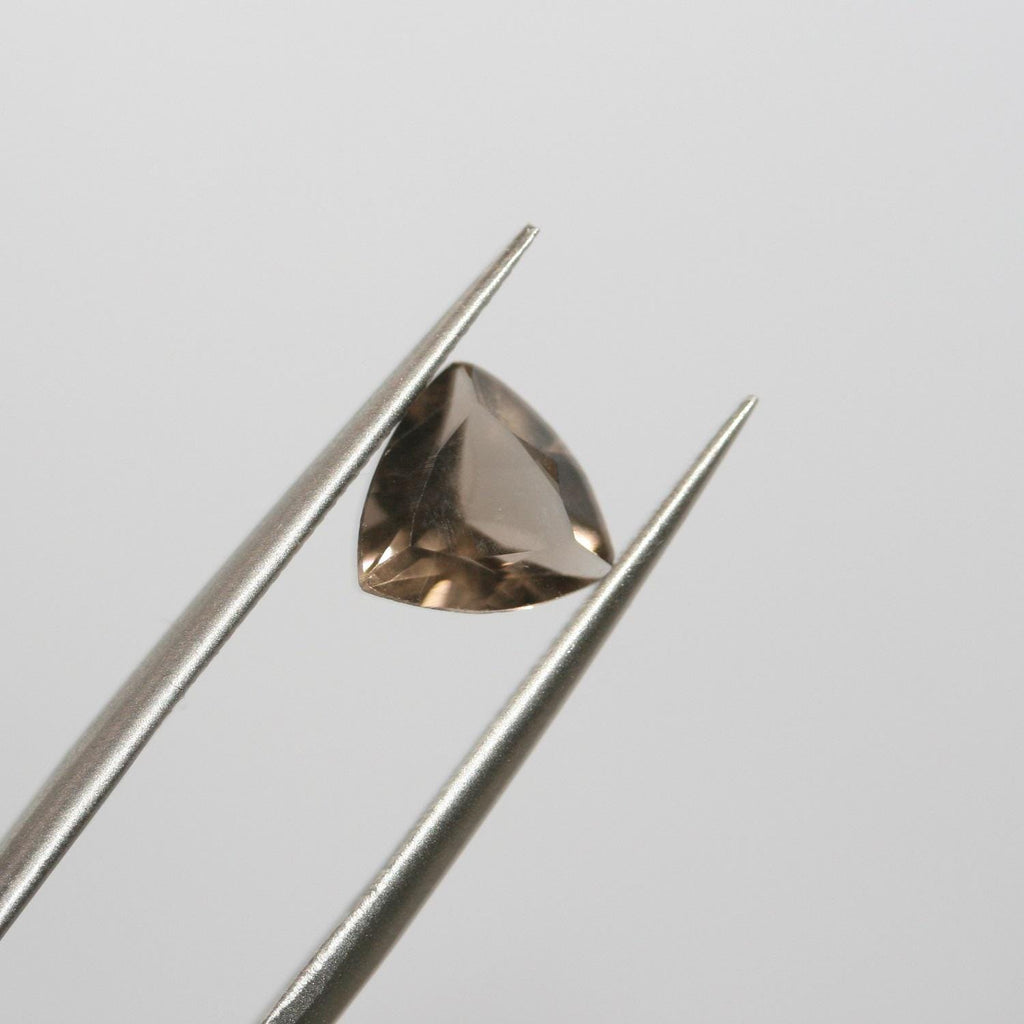 Lote de 6 trillones de cuarzo ahumado facetado de 8 mm.