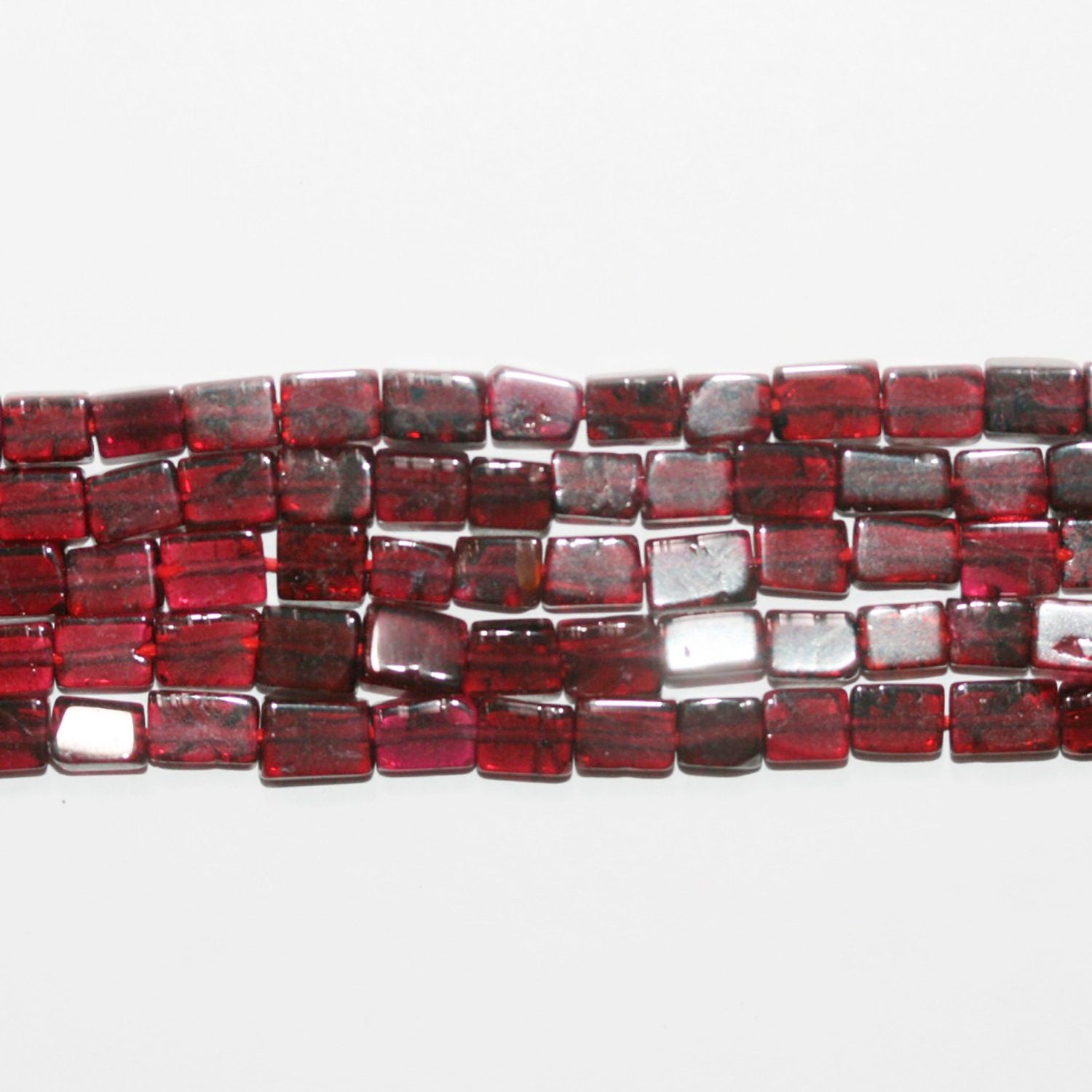 14" St Garnet Smooth Prism Beads 7x5mm.-Strand 38cm