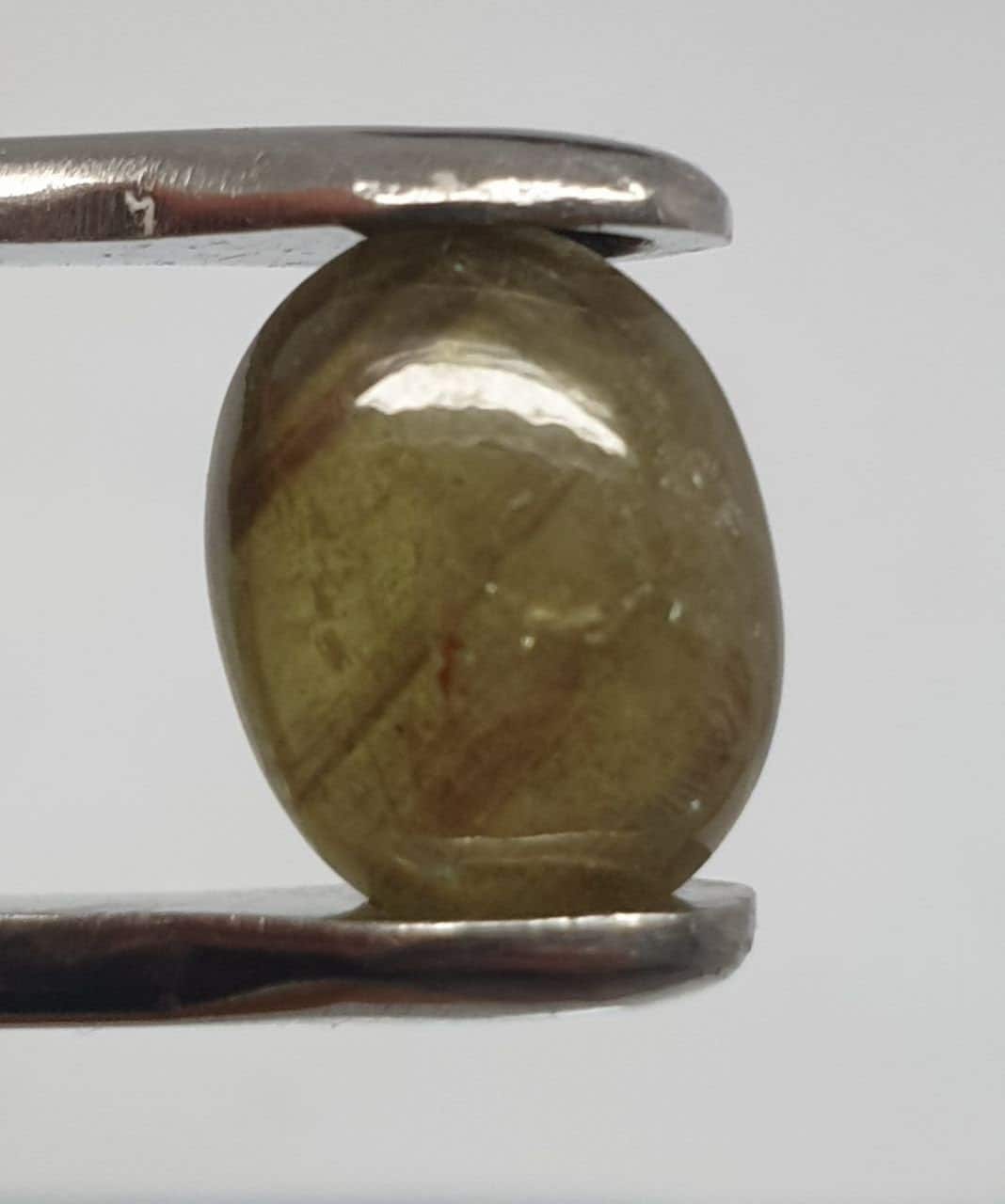 Green Sapphire Oval Cabochon 11.7x9mm.(5.7ct.).