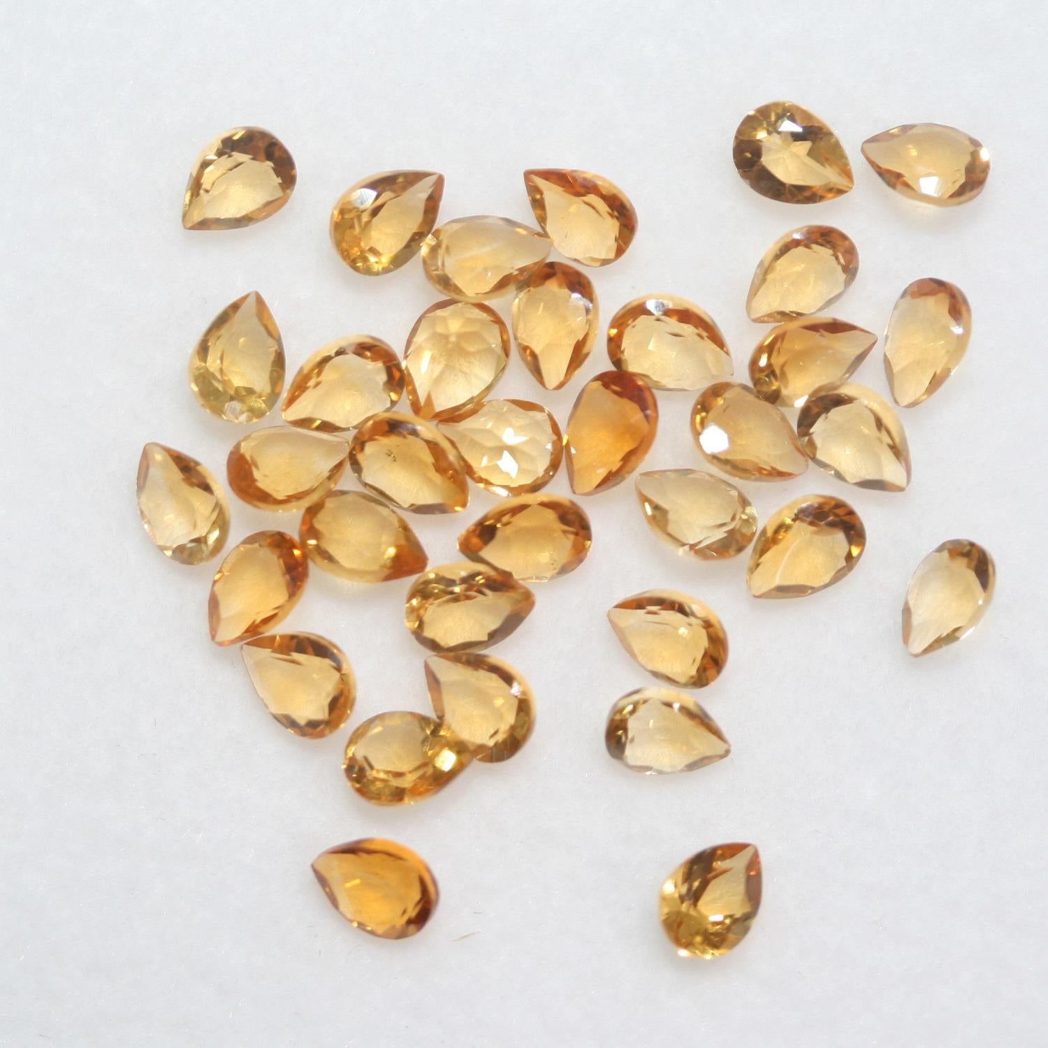 Lot de citrine facettée en forme de goutte 4x3mm. (5CT).