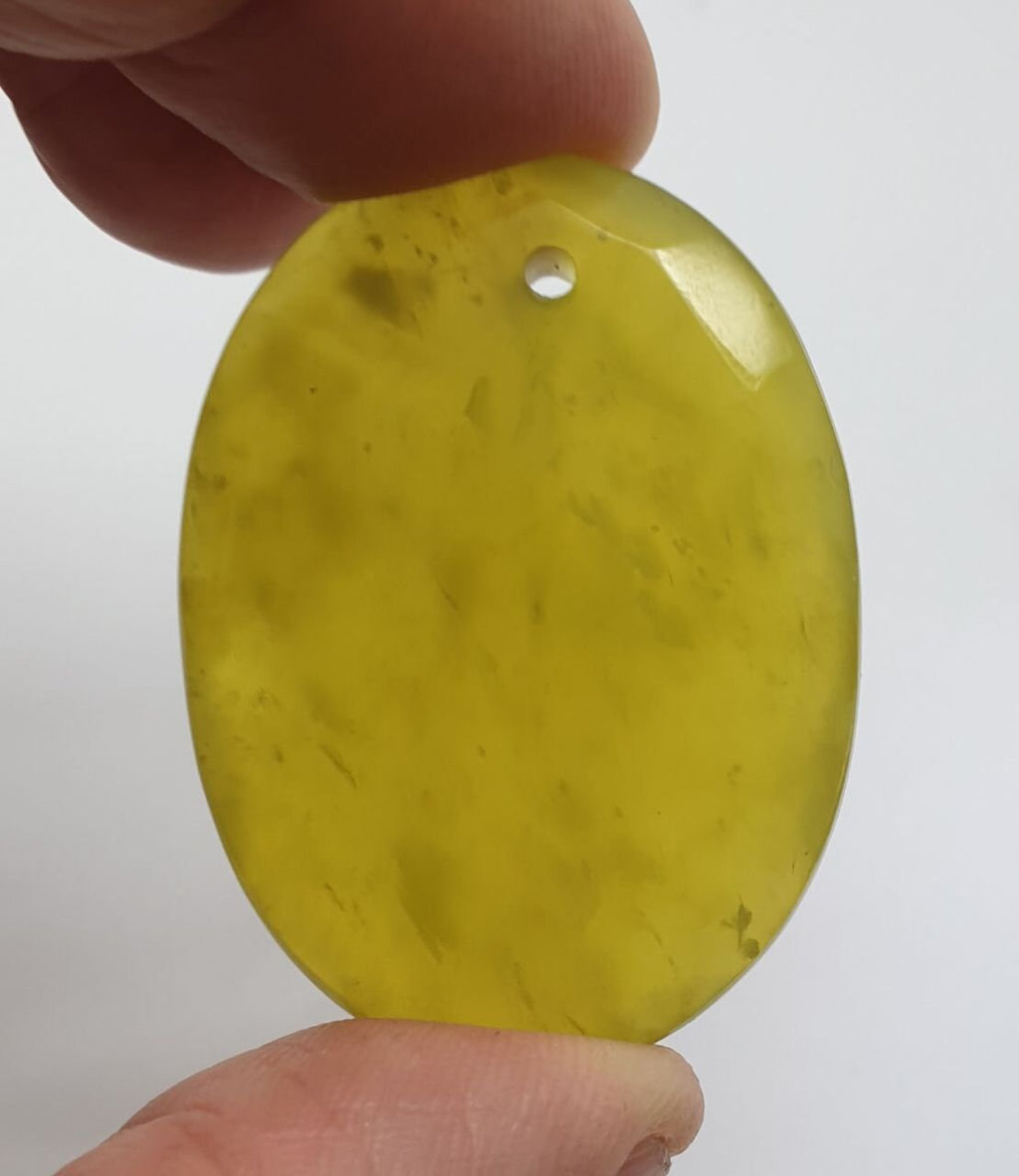 Pendentif ovale à facettes serpentines 30x40mm