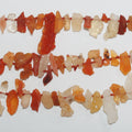 Cuentas de ópalo de fuego sin pulir de 40 cm, 10-22 mm (aprox. - Hilo de 40 cm)
