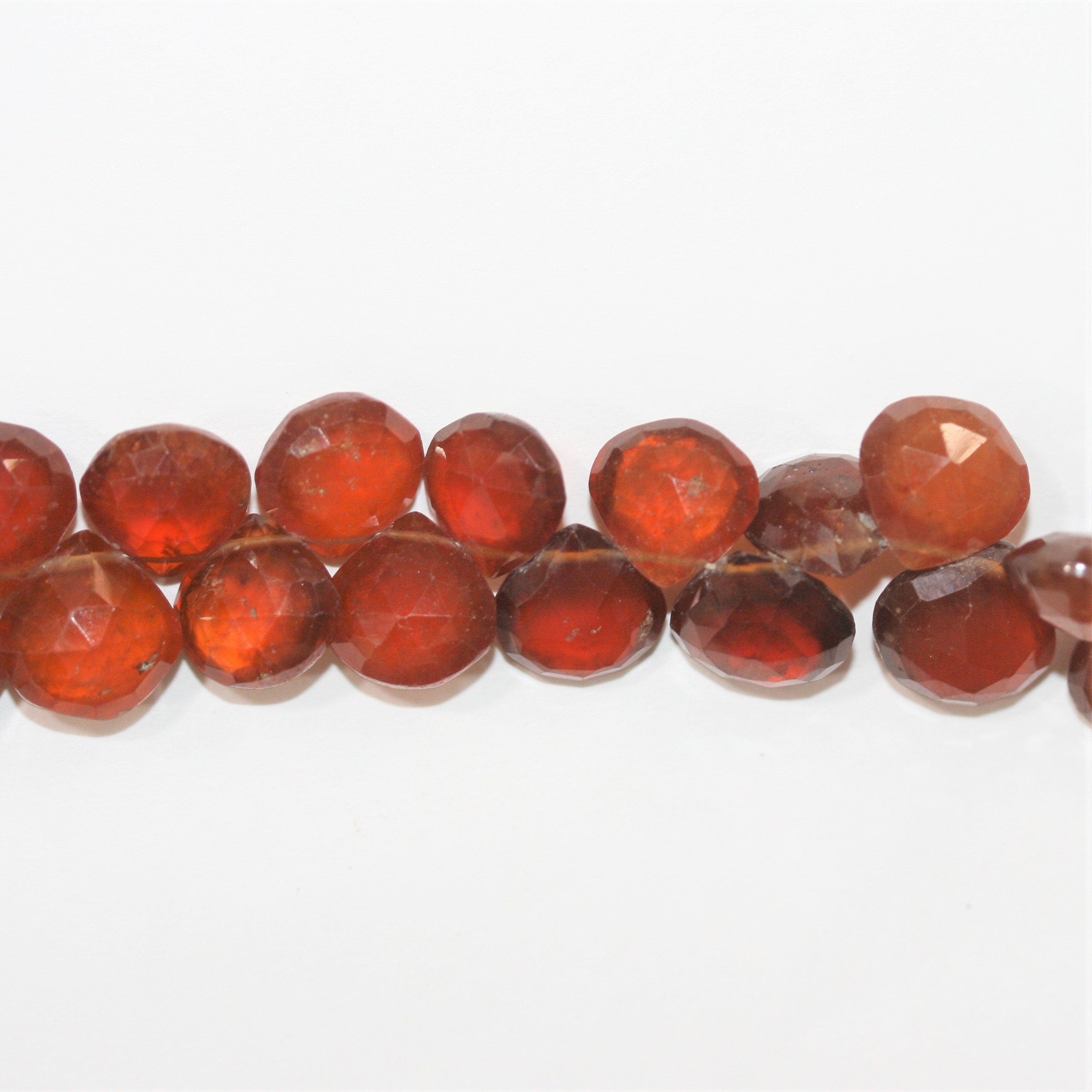 Cuentas de granate St Hessonite facetadas de 7", 8-11 mm. Aprox. - Hilo de 17 cm.