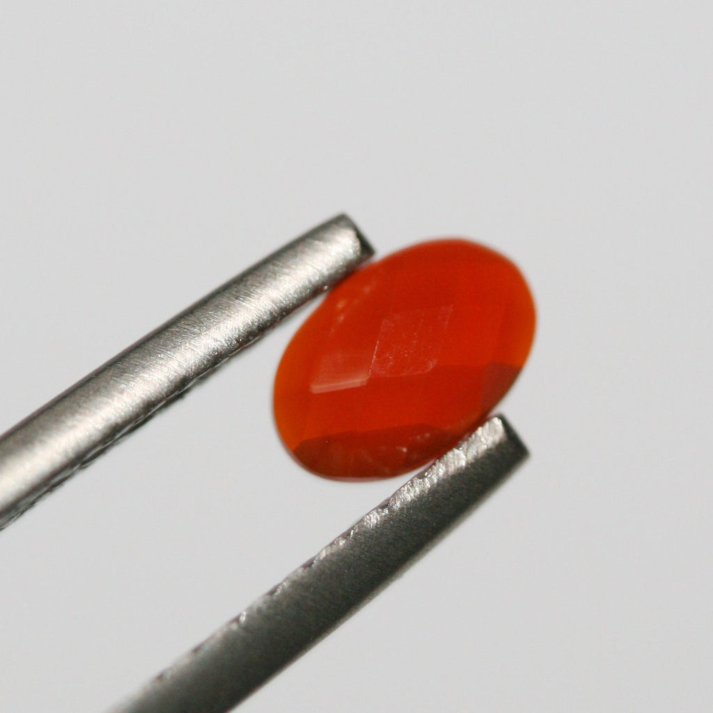 Lot de 15 cabochons ovales à facettes en cornaline 8x6mm. (15 pièces)