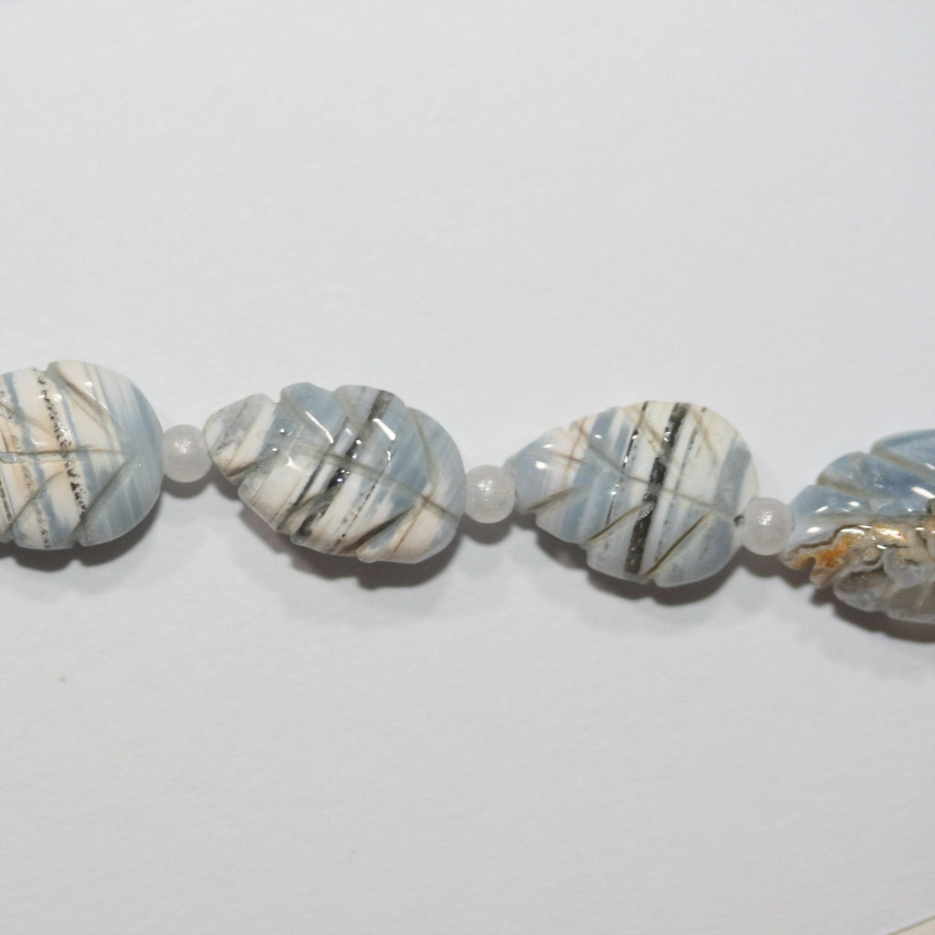 Cuentas de hoja galonadas de ópalo azul de 8" (12 x 8 mm). Aprox. - Hilo de 20 cm. - Artículo 15029