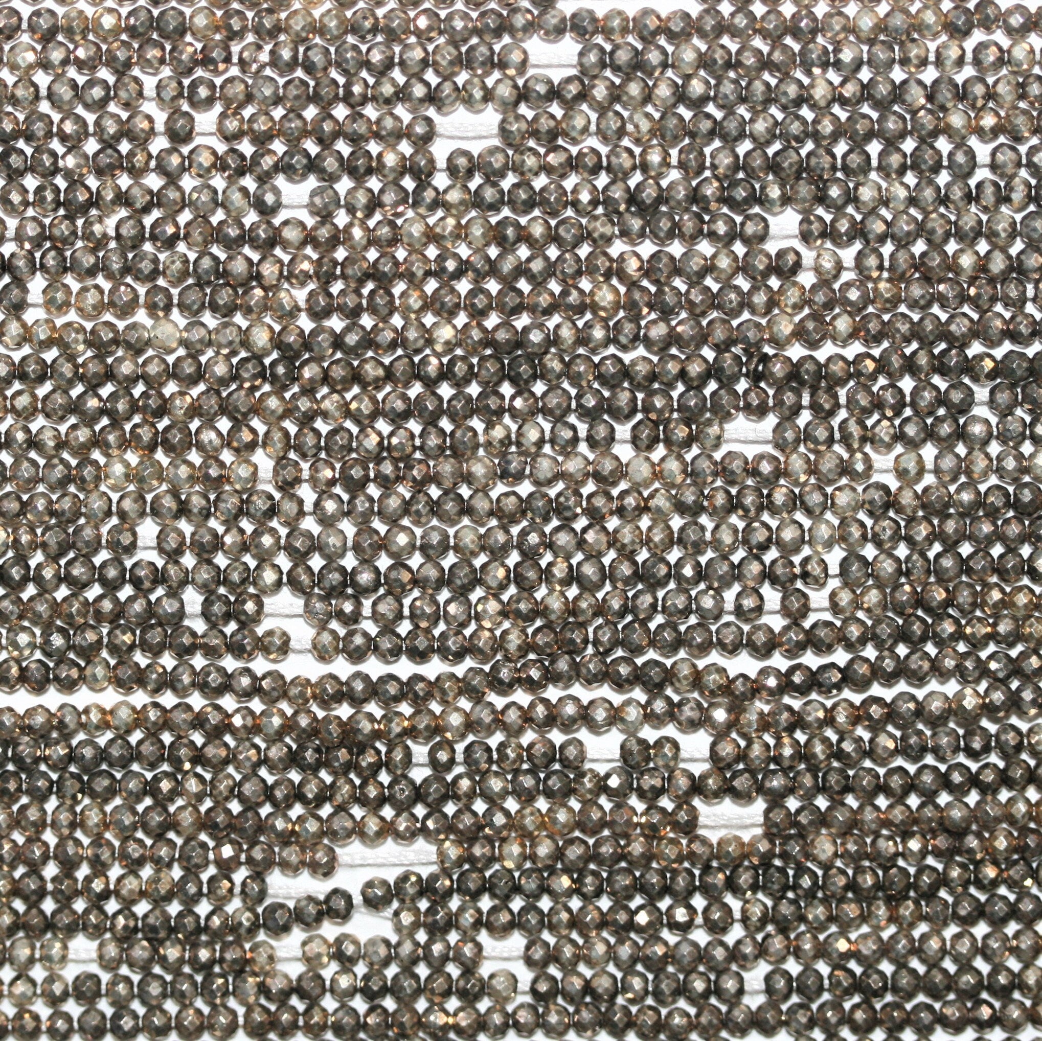 13" St Silver Pyrite Faceted Round 2mm.-Strand 33cm.