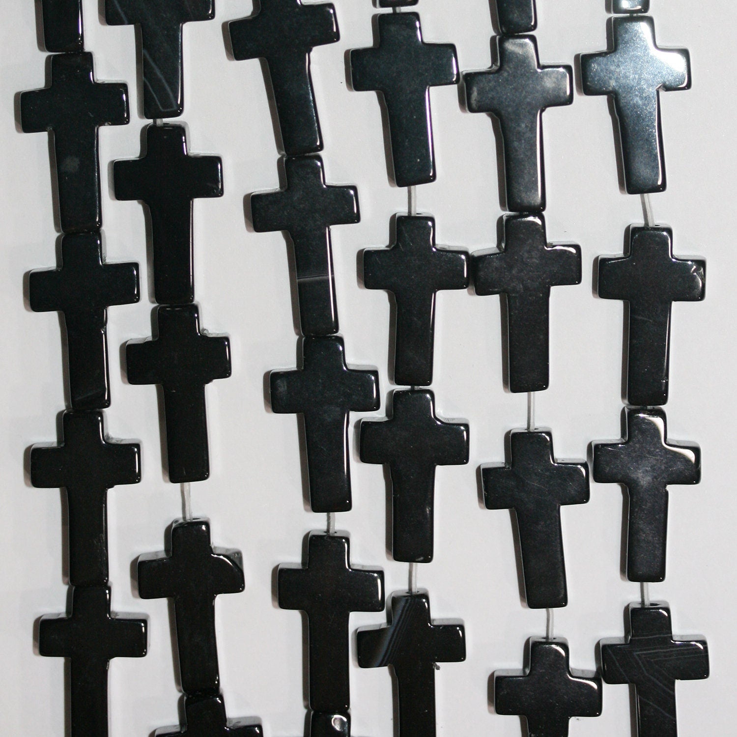 16" Cuentas Cruzadas Lisas de Ónix Santo 20x12mm.-Hilo 40cm.