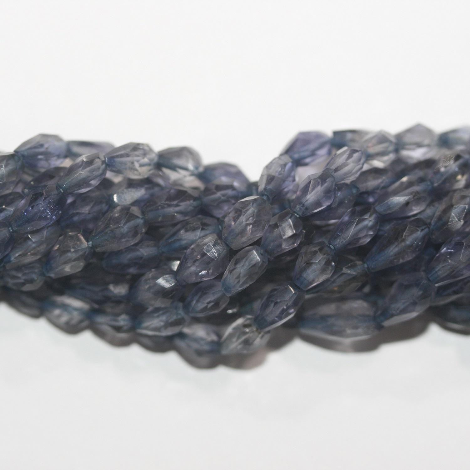 13" St Iolite Faceted Drop Beads 7x5mm. Approx.-Strand 33cm.-Item.4908