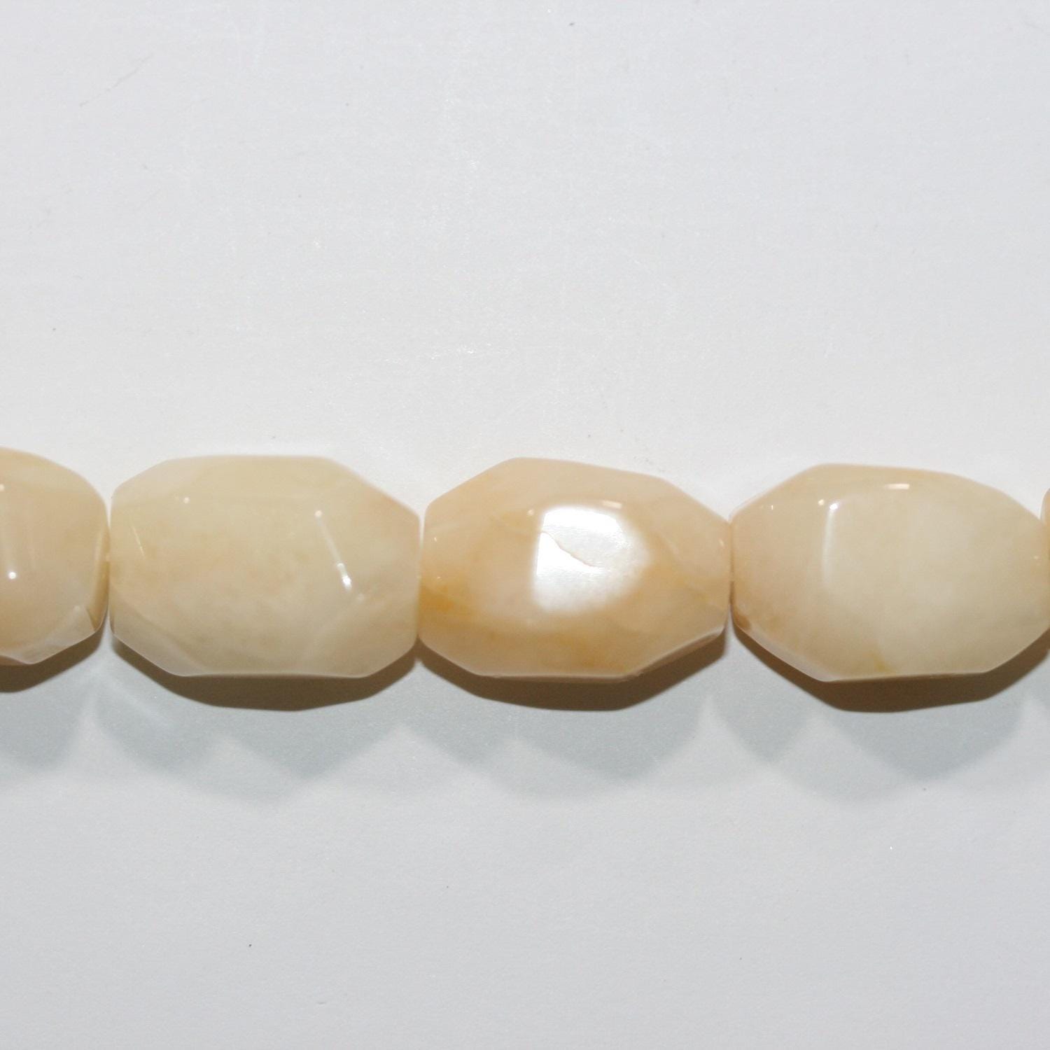 Cuentas de jade amarillo facetadas de 16" (17 x 15 mm). Hilo de 40 cm aprox.