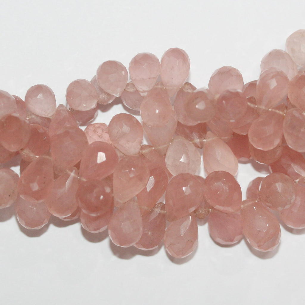 Perles en quartz rose facettées de 8 pouces (12 x 8 mm). Longueur du fil : environ 21 cm.