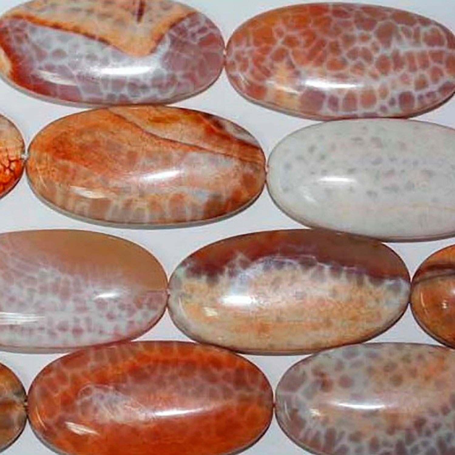 Cuentas ovaladas lisas de ágata de fuego de 40 x 20 mm (16") - Hilo de 40 cm