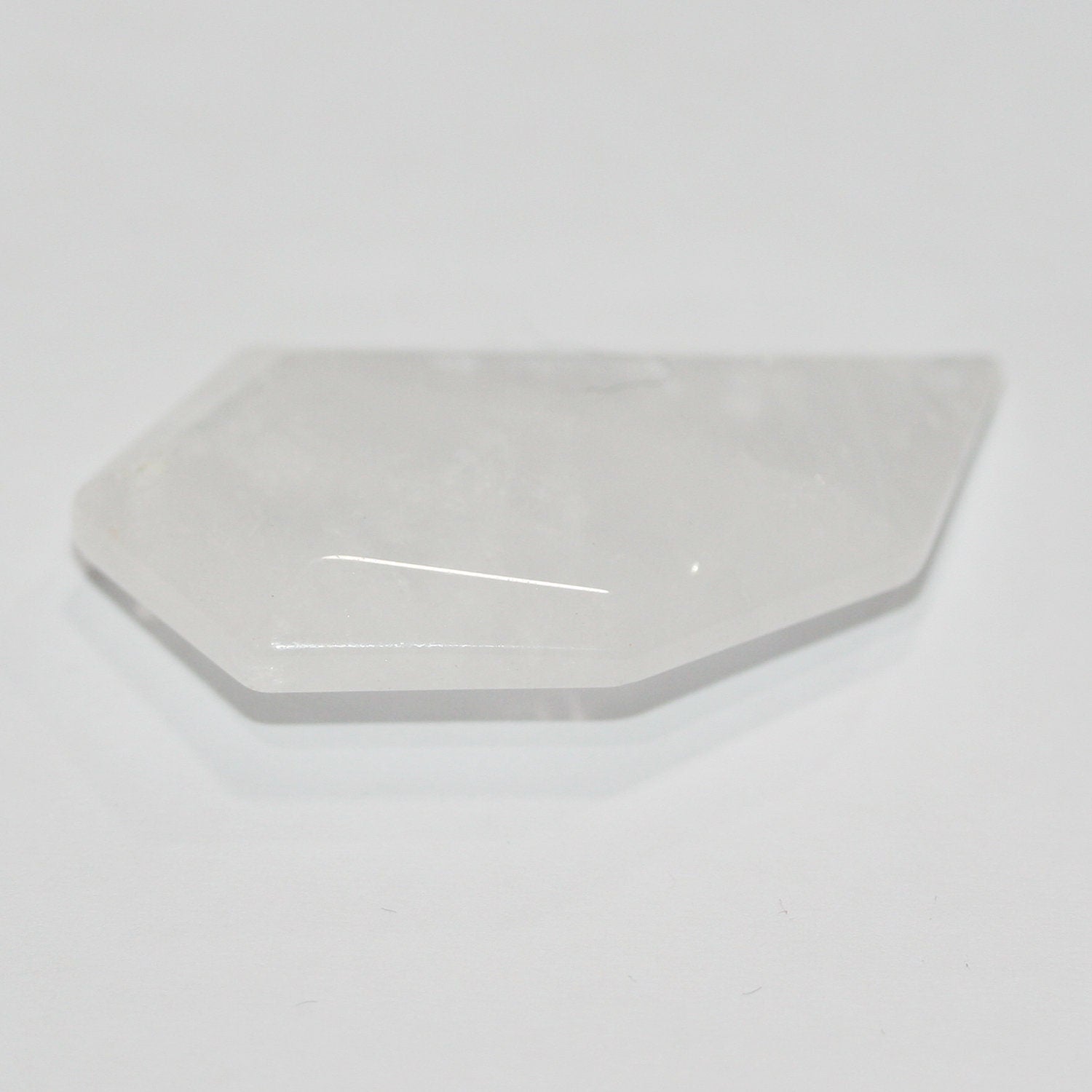 Pendentif bâtonnet à facettes en quartz cristal de roche 40x20mm.