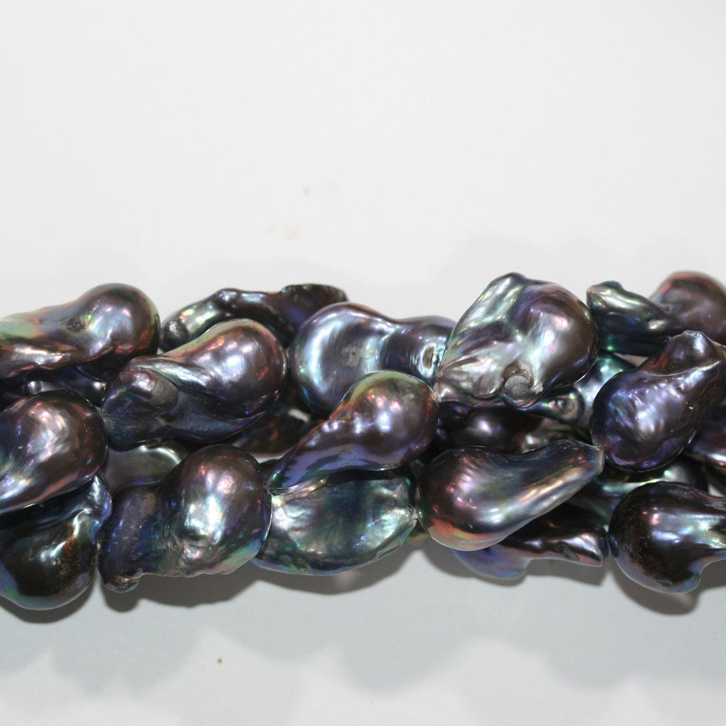 Perle baroque gris foncé d'eau douce, 16 pouces (40 cm), 25 x 12 mm. Longueur du fil : environ 40 cm. Réf. 14784. Perles naturelles à prix de gros.