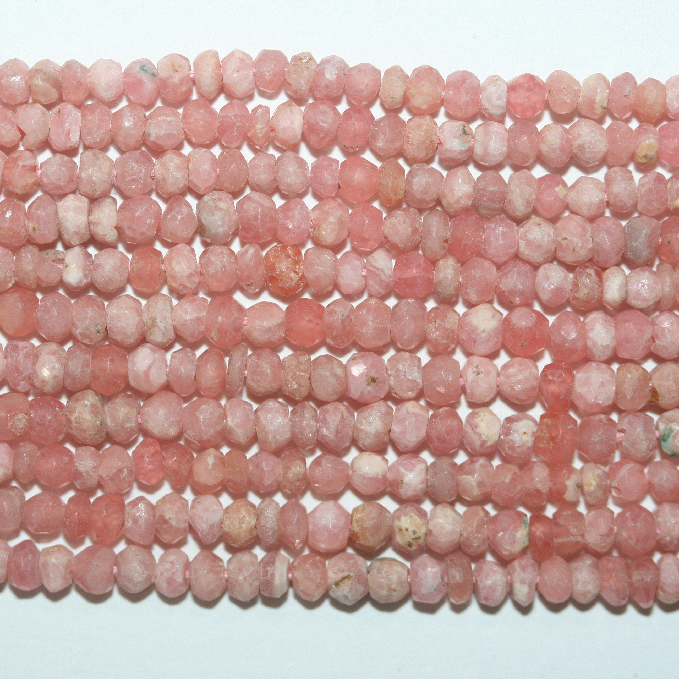 13" St Rhodochosite Faceted Rondelle Beads 3.5x2mm.-Strand 34cm.