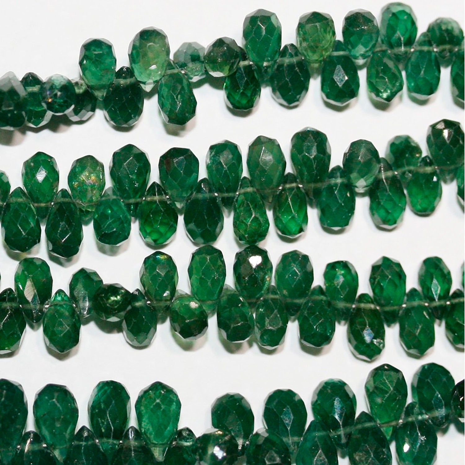 Cuentas de apatita verde esmeralda facetadas de 7 x 4 mm (tira de 20 cm)