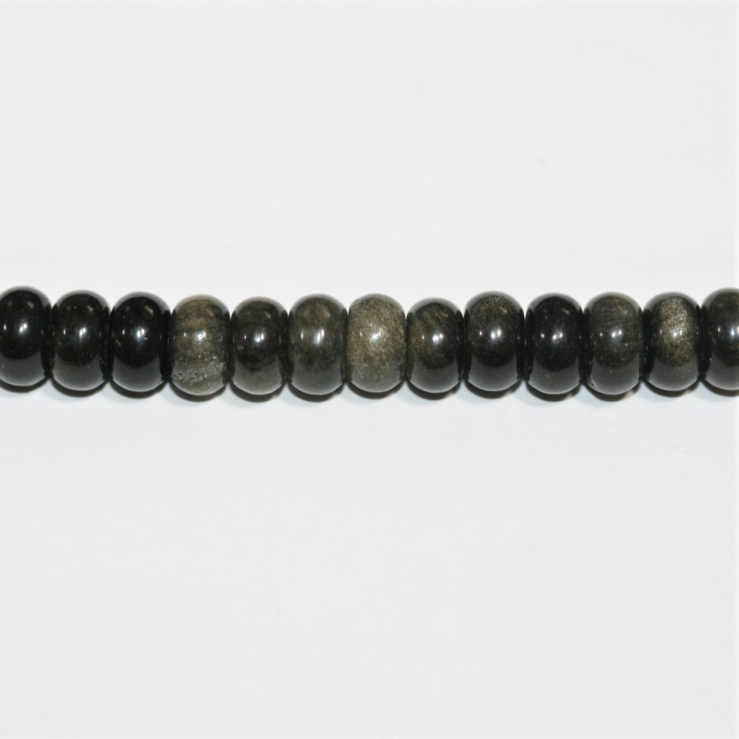 Perles rondelles lisses en obsidienne St 15" 8x5mm.- Brin 39cm.