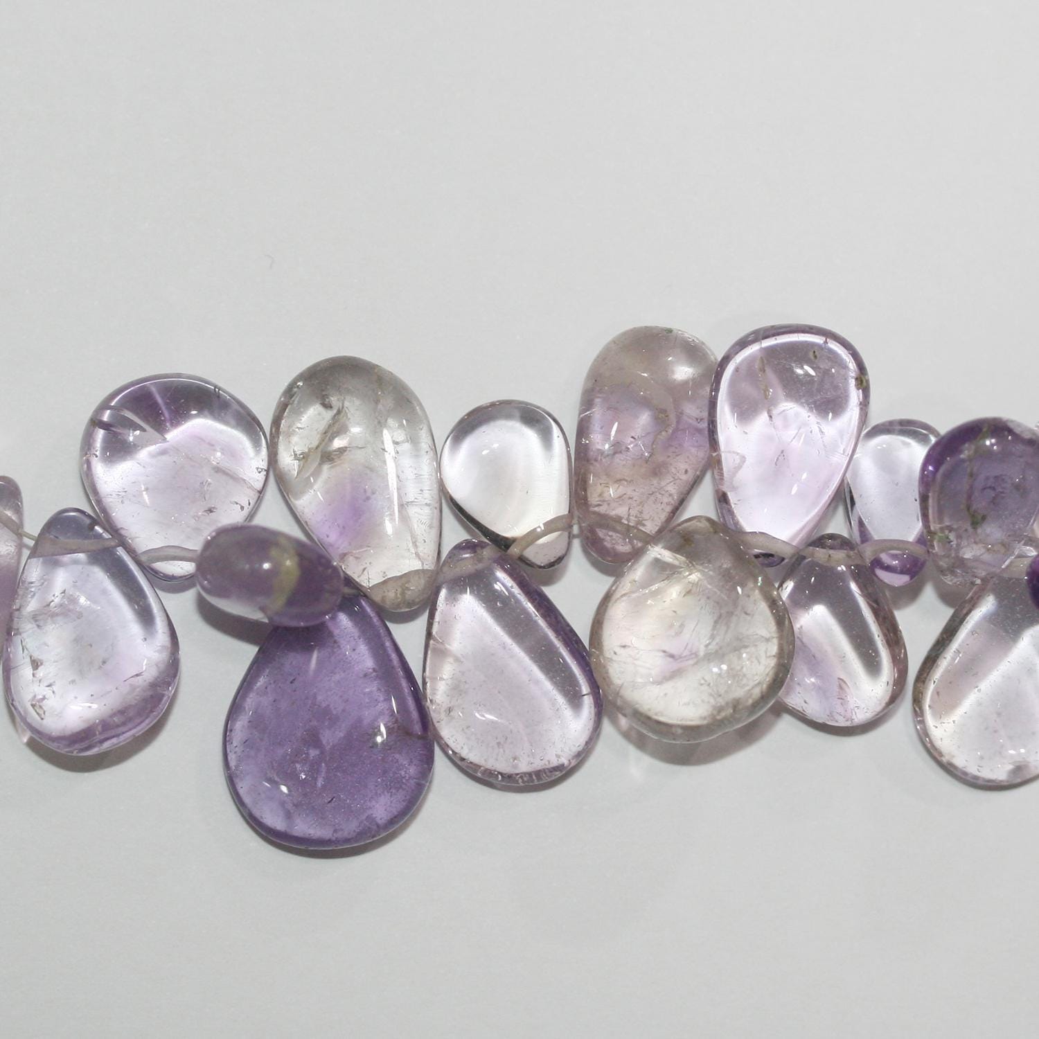 Cuentas de amatista de 8" (9 x 6-18 x 14 mm) con forma de gota lisa. Aprox. - Hilo de 22 cm.