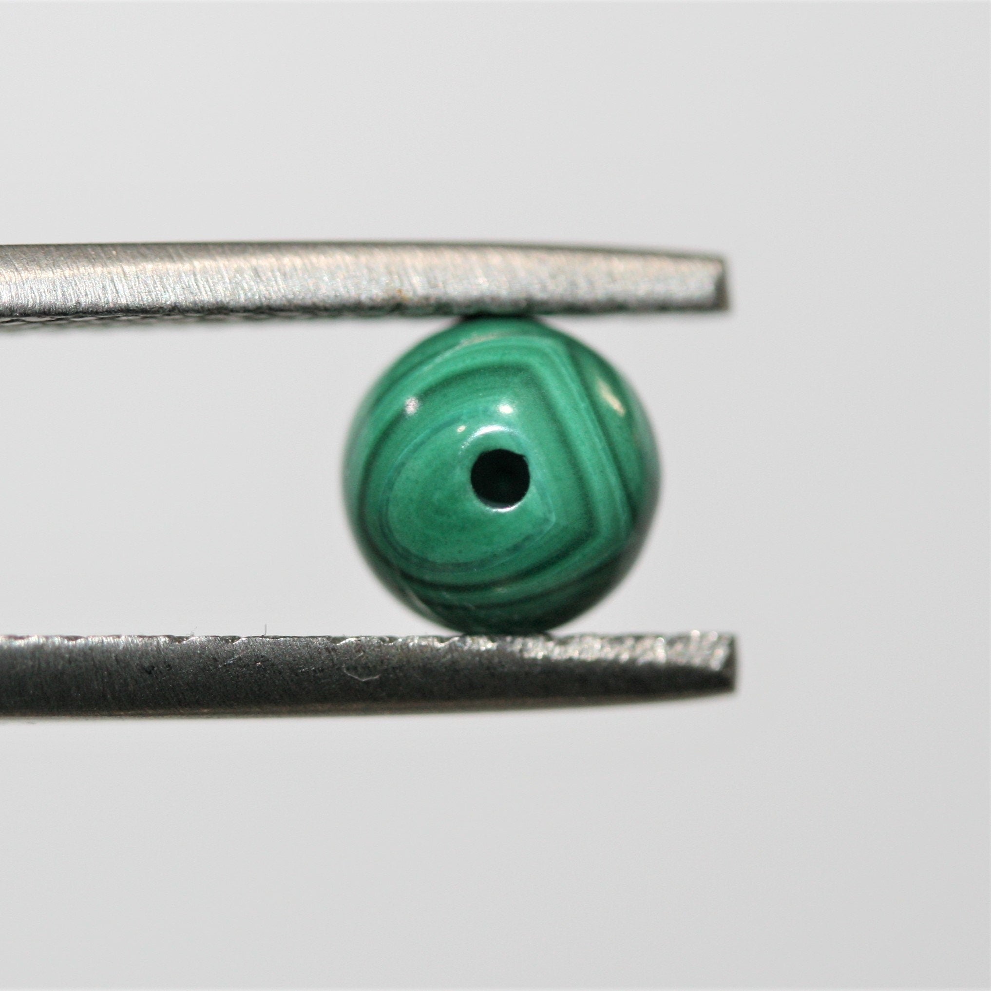 Malaquita Semiperforada Redonda Lisa 6mm.- 4 Piezas