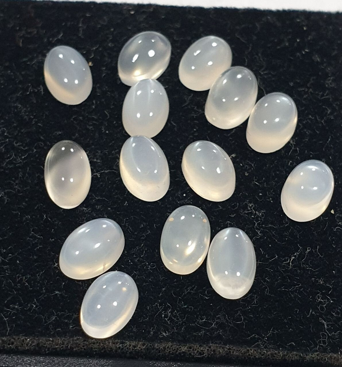 14 Pcs Lot White Moonstone Oval Cabochon 6x4mm. (14 pcs.)