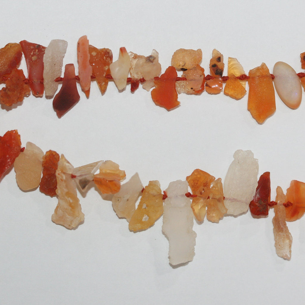 Cuentas de ópalo de fuego sin pulir de 40 cm, 10-22 mm (aprox. - Hilo de 40 cm)